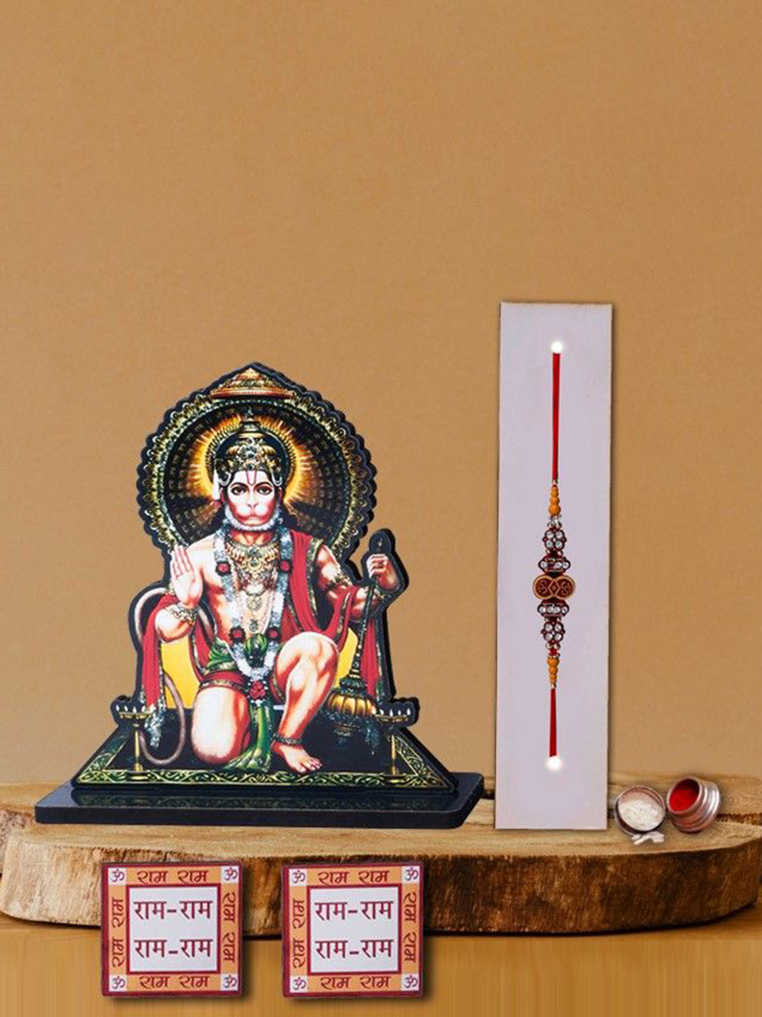 

Phirki Studio Set of 2 Stone Studded Rakhi With God Figure Table stand & Roli Chawal, Red