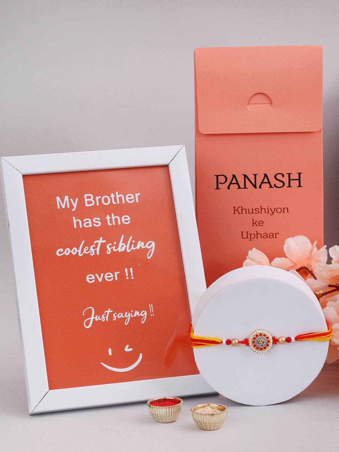 

PANASH Gift Set Of 2 Gold Plated Rakhi With Photo Frame & Roli Chawal