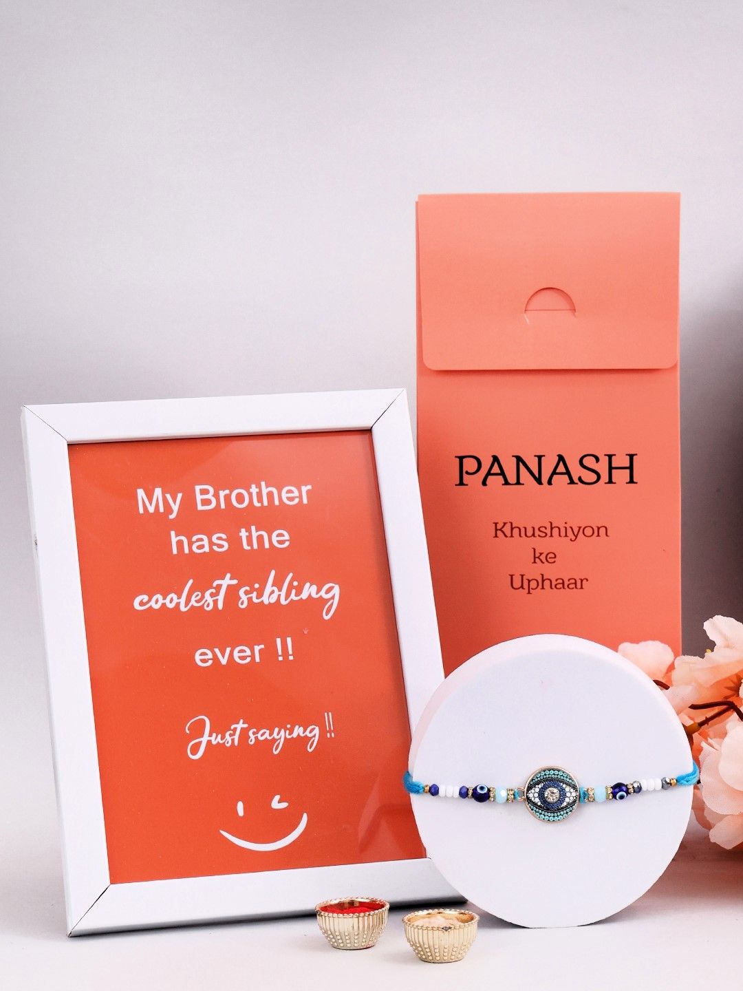 

PANASH Set Of 2 Beaded Rakhi With Photo Frame And Roli Chawal, Gold