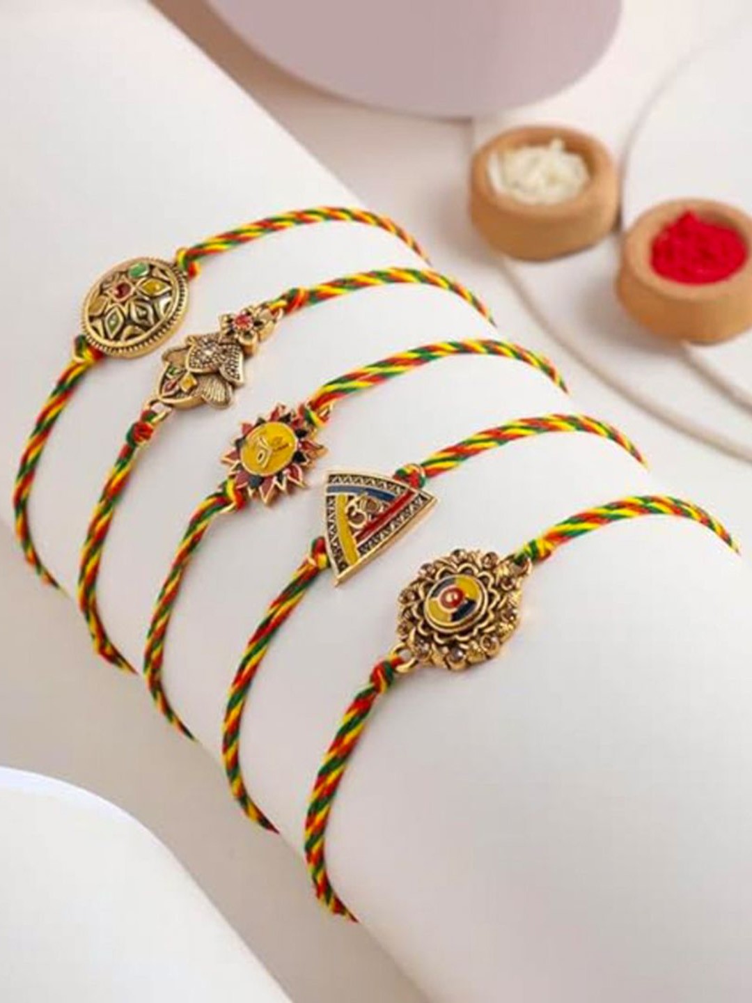 

Floweraura Set Of 5 Stone Studded & Beaded Thread Rakhis With Roli Chawal, Red