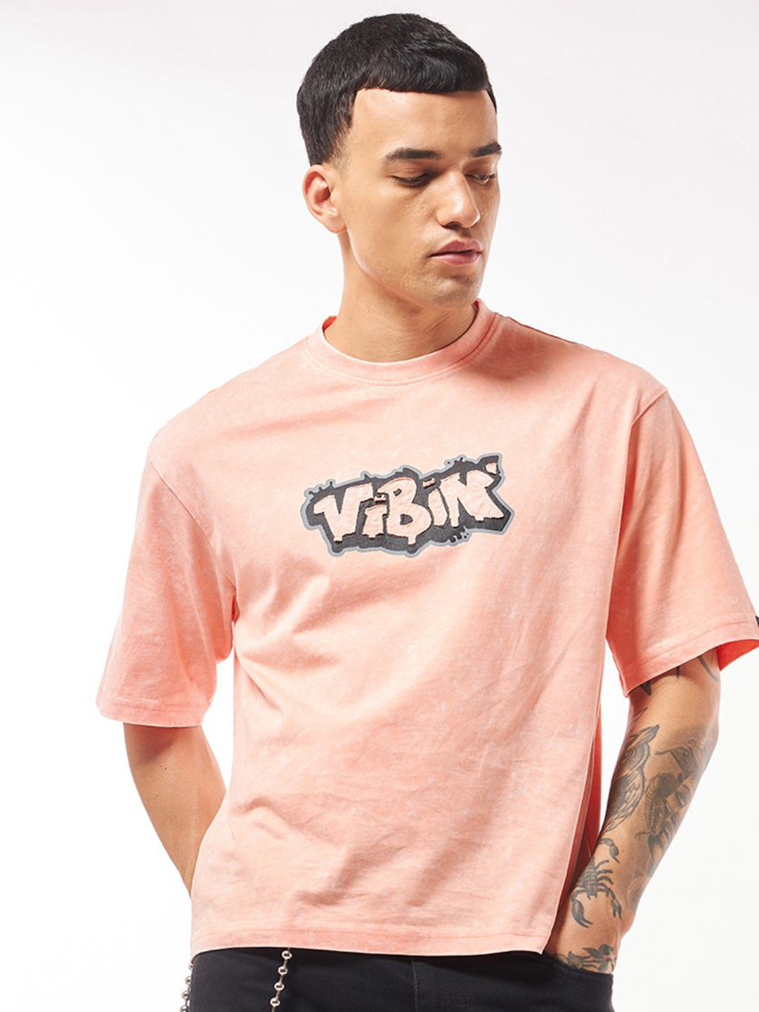 

Bewakoof Men Graphic Printed Round Neck Pure Cotton Oversized T-Shirt, Orange
