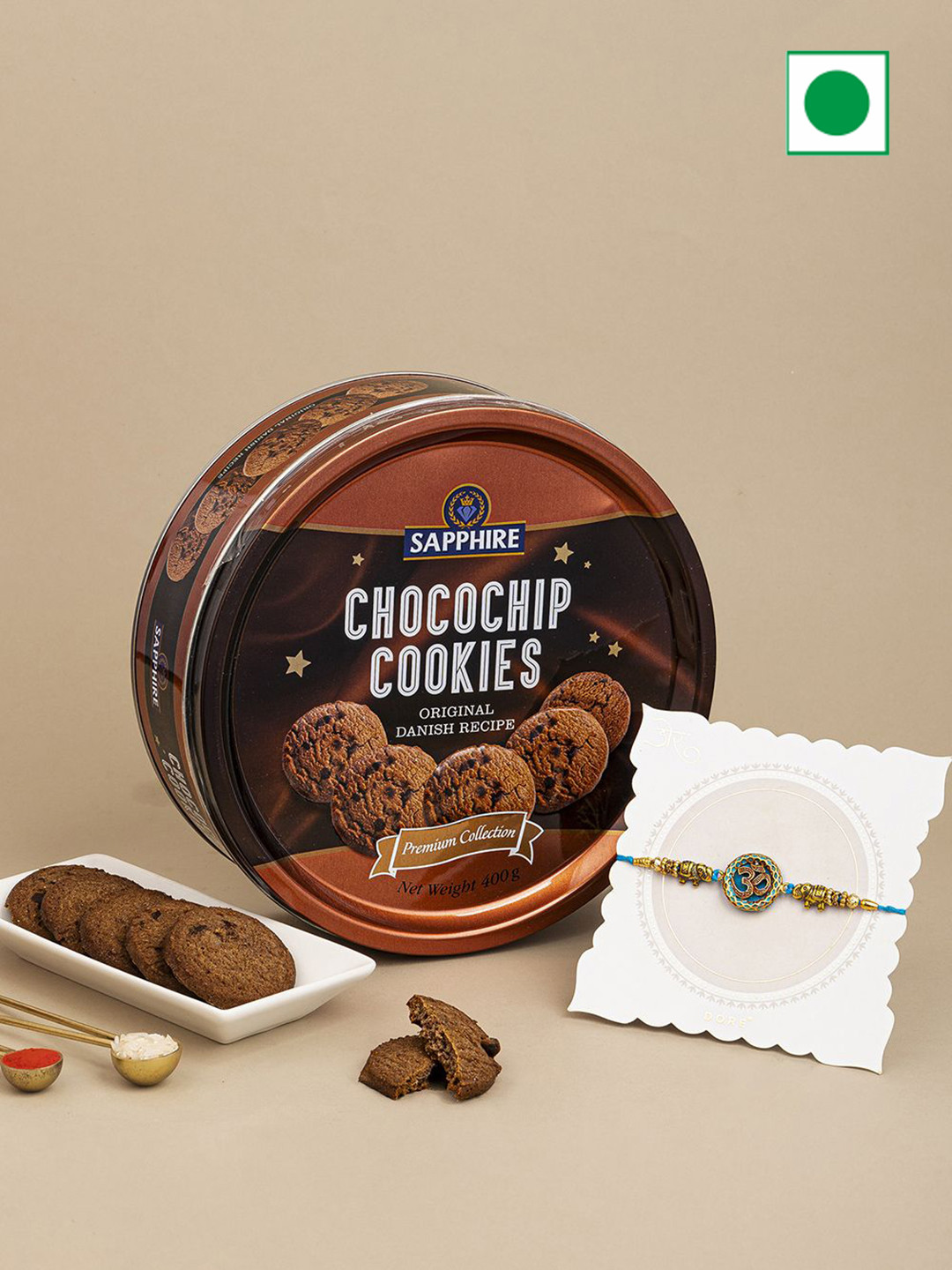 

Hyperfoods OM Thread Rakhi With Sapphire Chocochips Cookies, Brown
