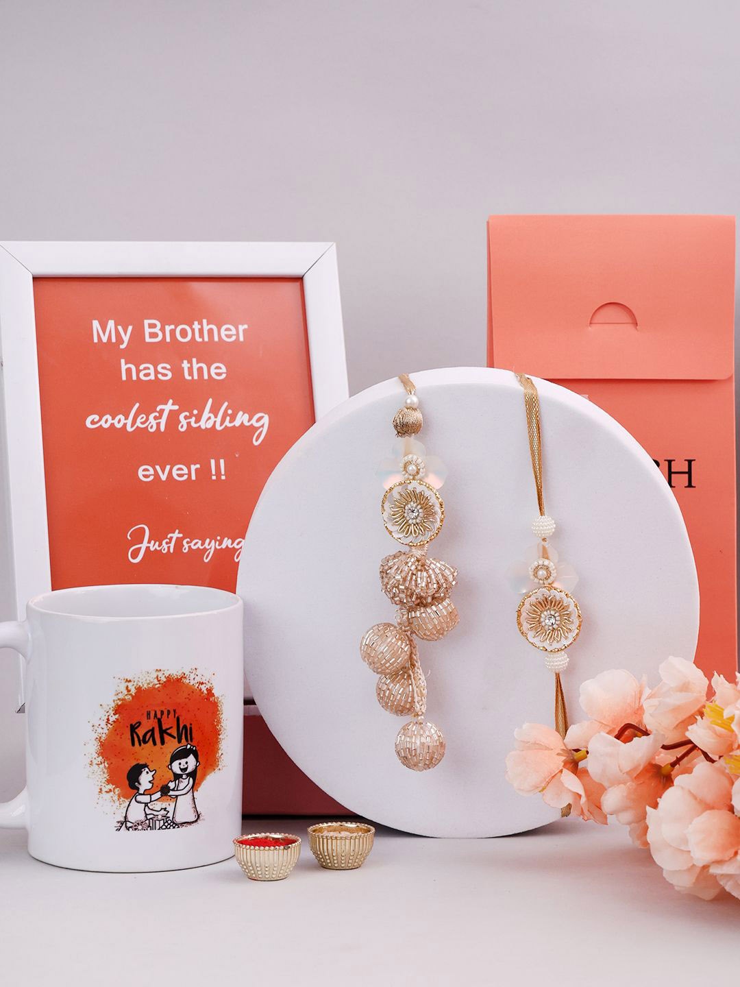 

PANASH Set of 3 Bhaiya and Bhabhi Rakhi with Mugs & Photo Frame, Gold