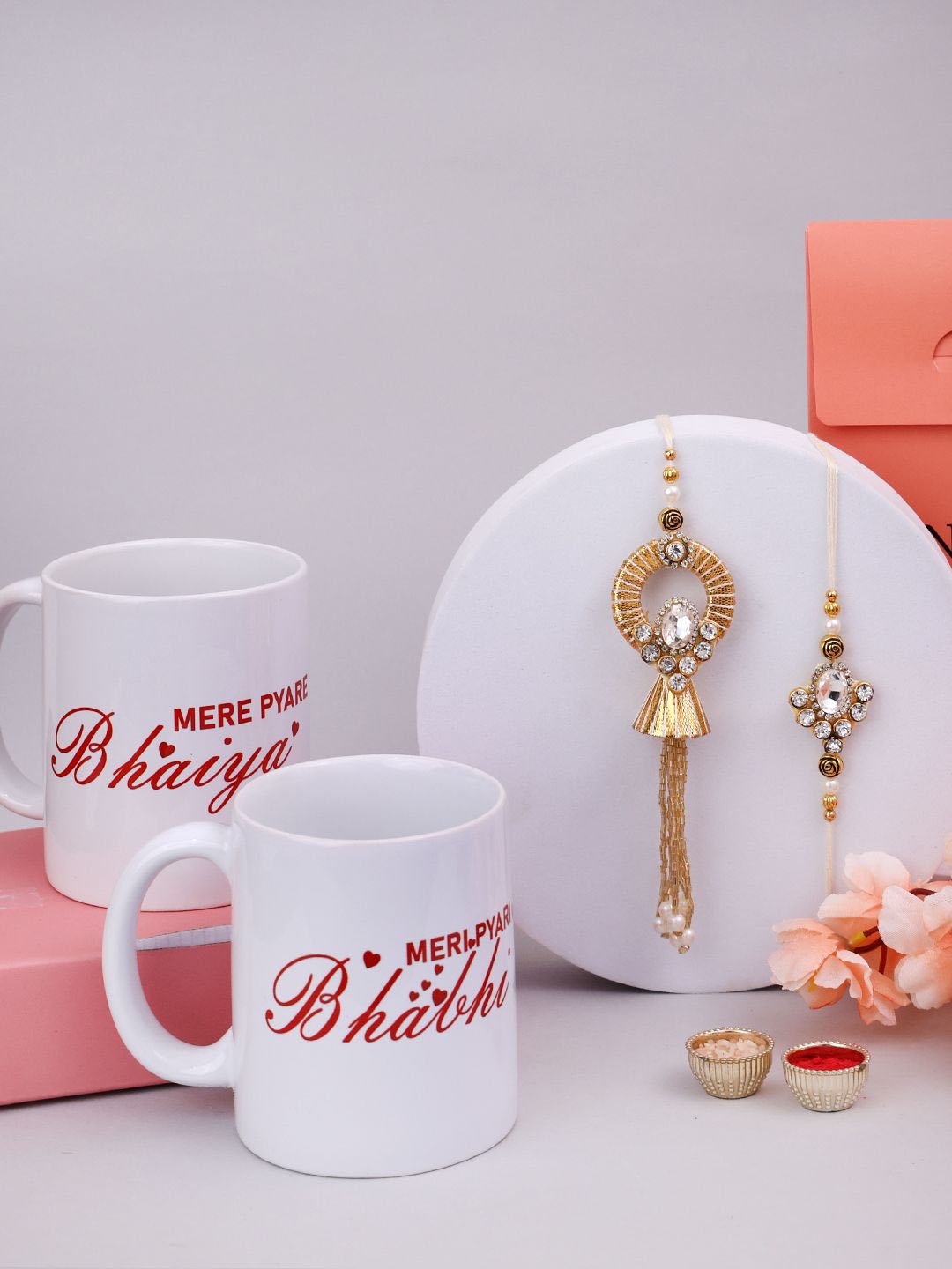 

PANASH Beaded Bhaiya and Bhabhi Rakhi With Mere Pyaare Mugs And Roli Chawal, Gold