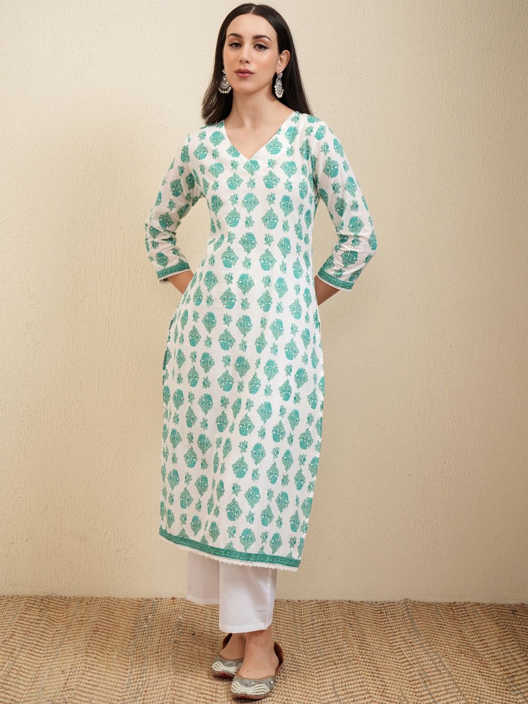 

Vishudh White Ethnic Motifs Printed V-Neck Cotton Staright Kurta