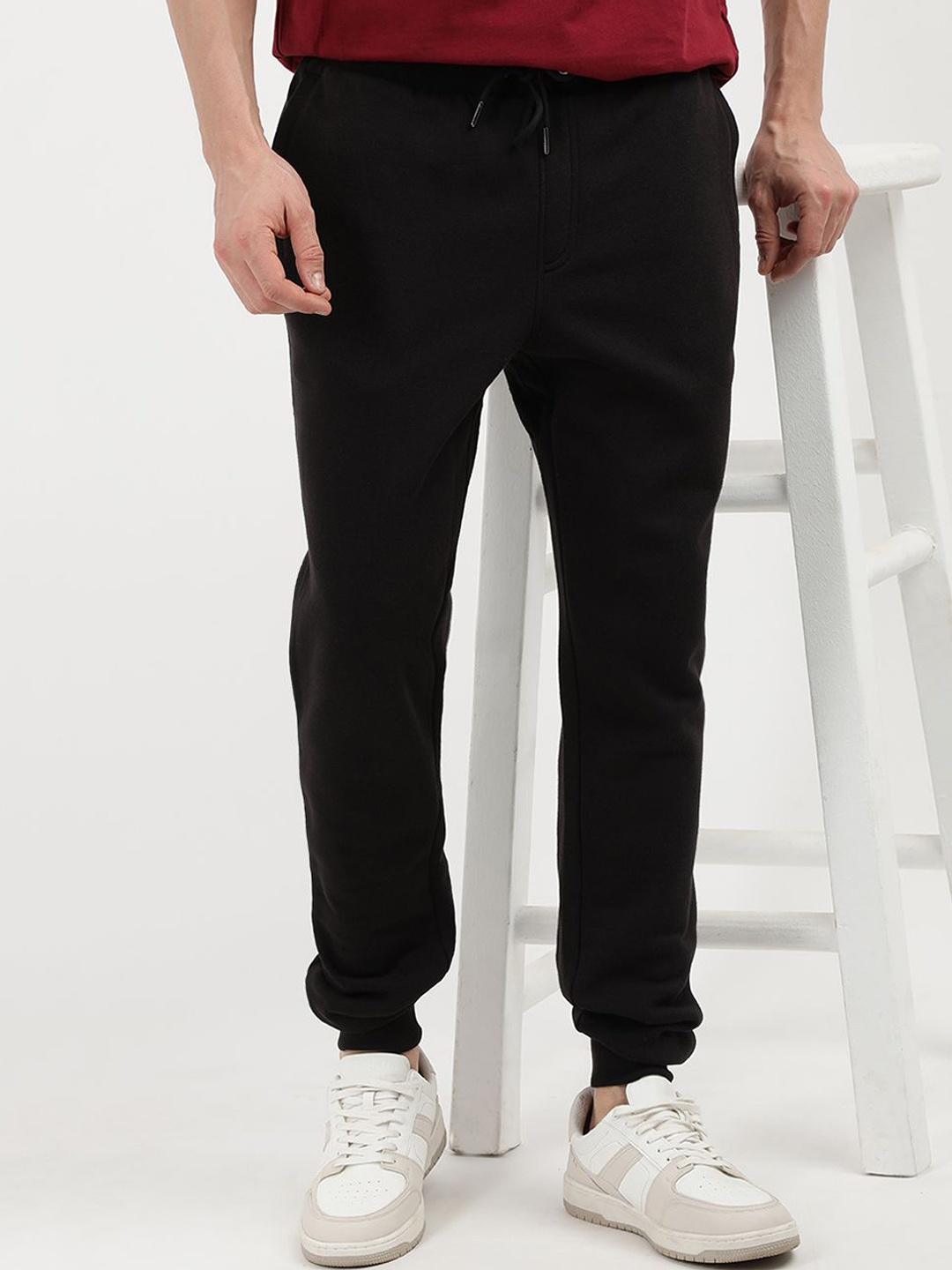 

Tommy Hilfiger Men Mid-Rise Regular Fit Jogger, Black