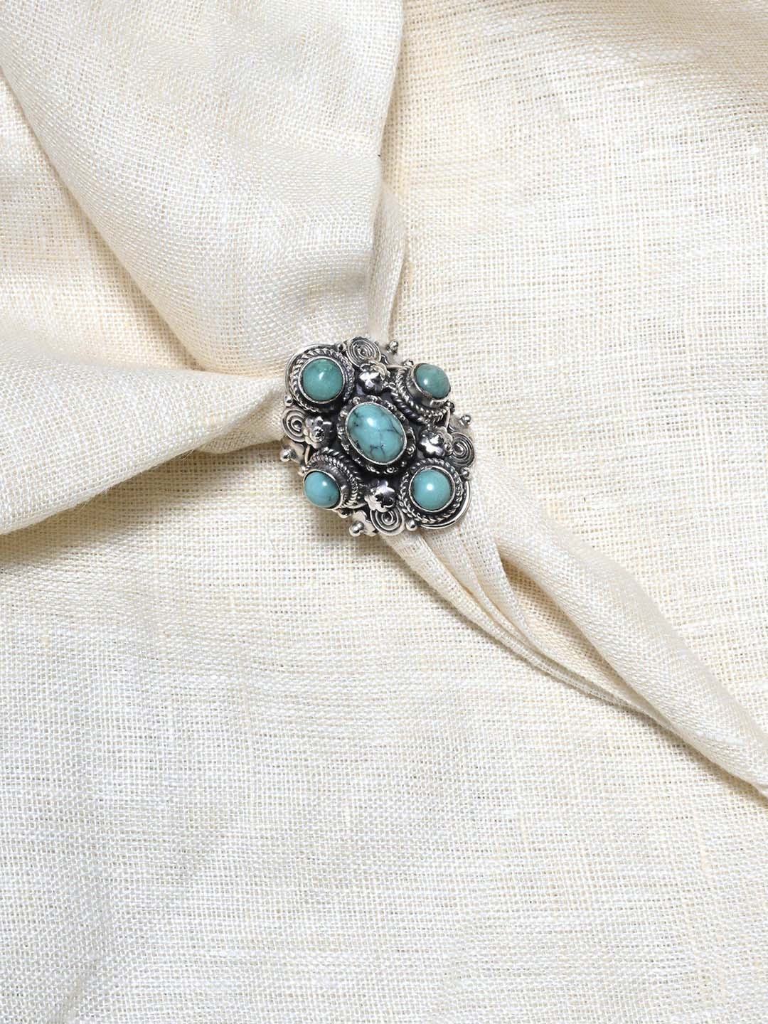 

Exotic India Tibetan Turquoise Adjustable Sterling Silver Ring