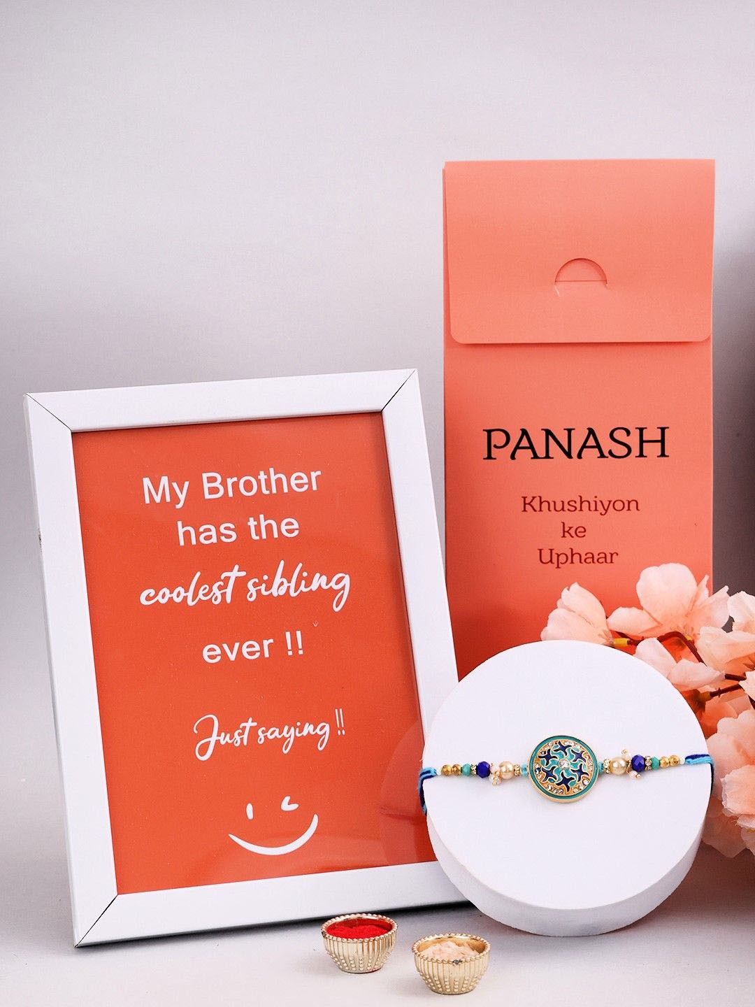 

PANASH Set Of 2 Rakhi And Photo Frame With Roli Chawal, Gold