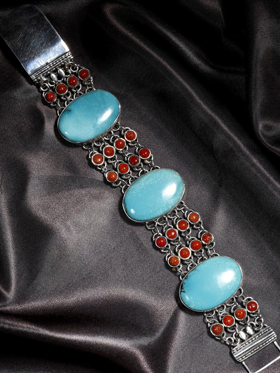 

Exotic India Turquoise and Coral Sterling Silver Bracelet