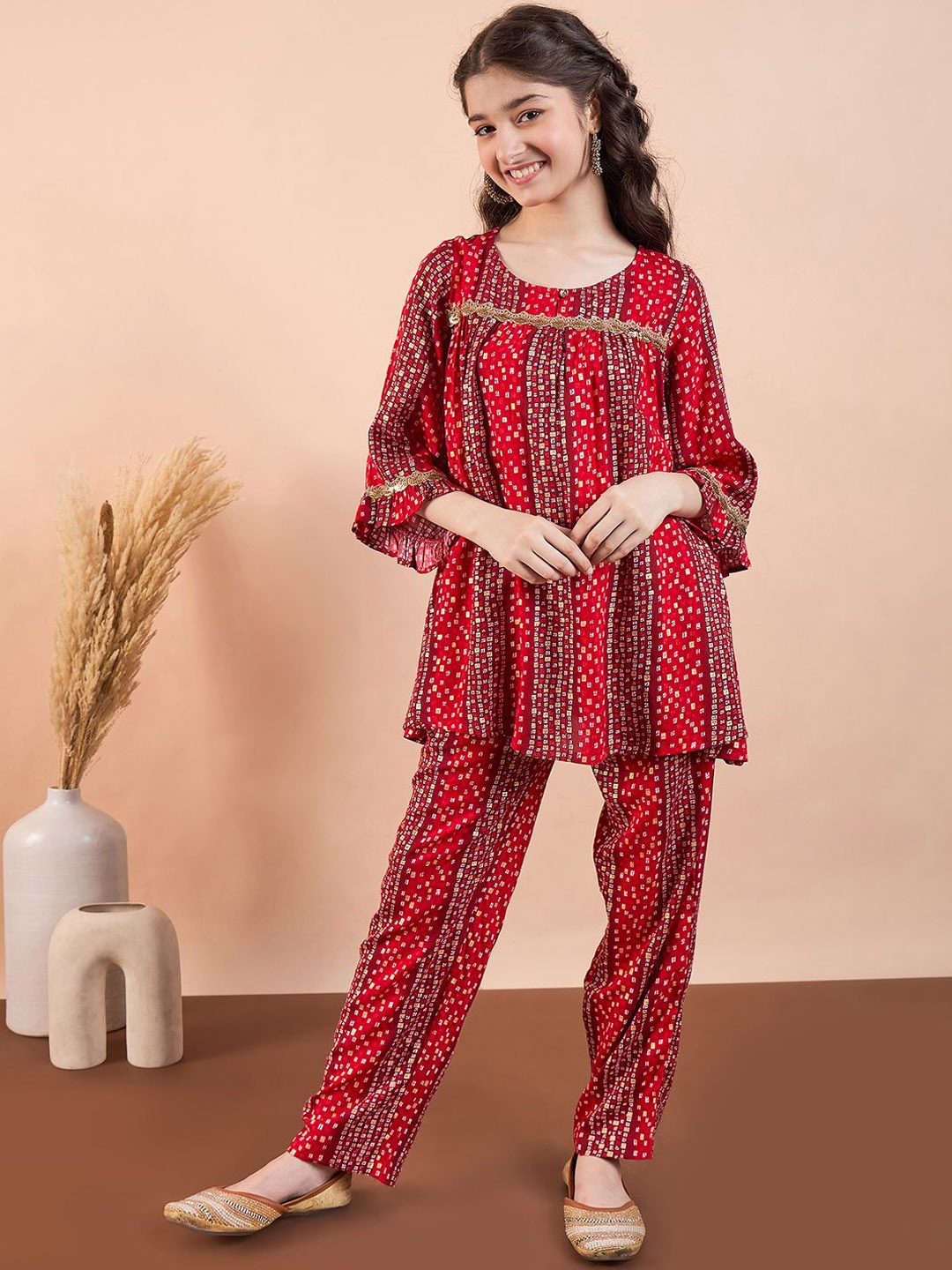 

Stylo Bug Girls Printed Keyhole Neck Bell Sleeves Kurta with Trouser, Red