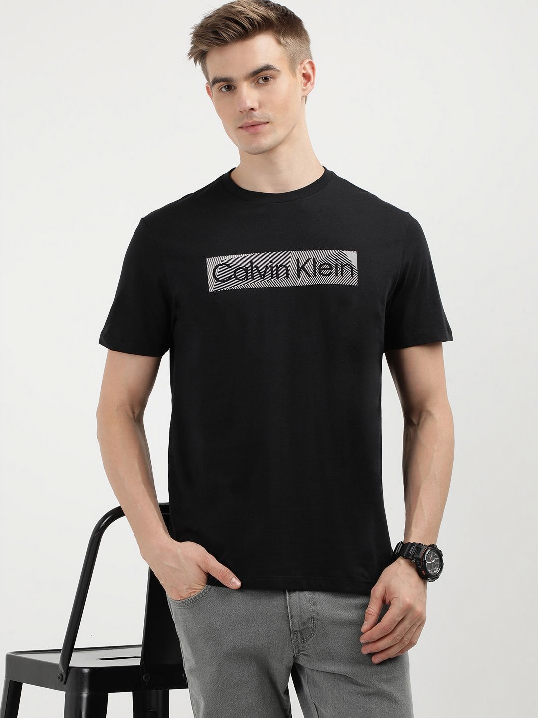 

Calvin Klein Jeans Men Typography Printed Monochrome T-shirt, Black