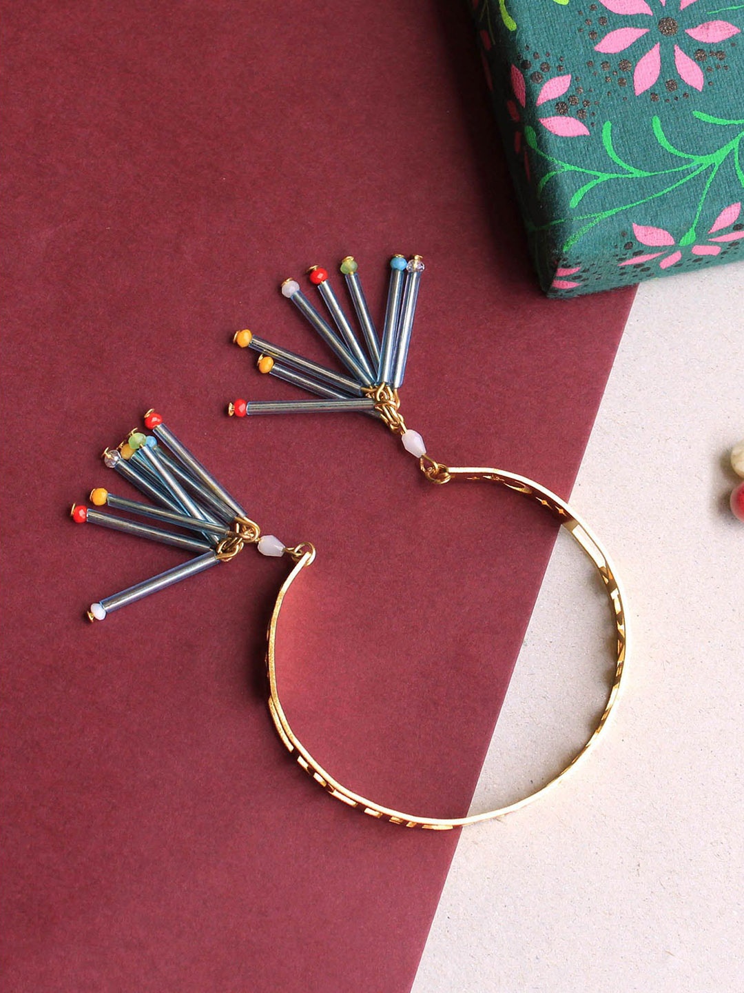 

BeAbhika To The Moon And Back Glass Tubes Multistrand Rakhi With Roli & Chawal, Gold