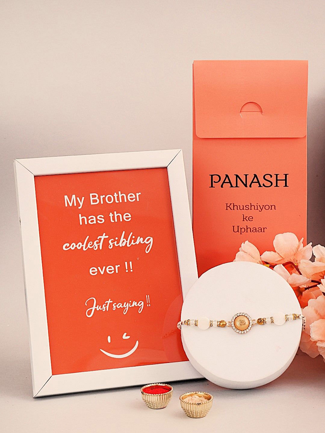 

PANASH Set Of 2 Beaded Rakhi With Photo Frame And Roli Chawal, Gold
