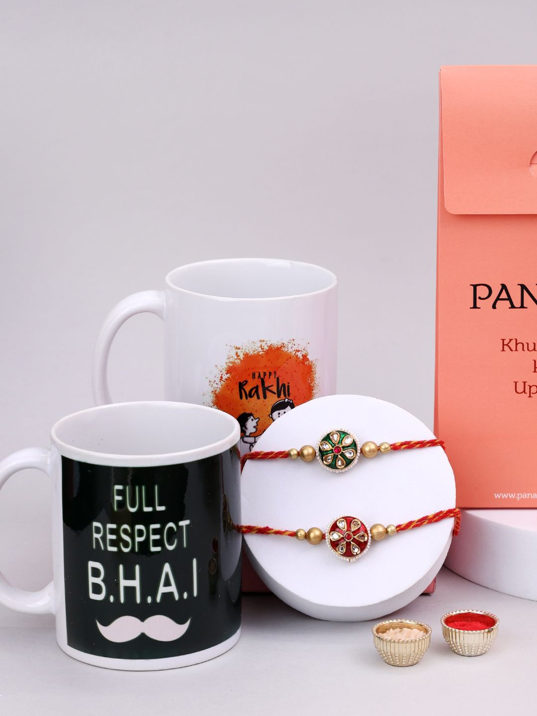 

PANASH Set Of 4 Beaded Rakhis With Mugs & Roli Chawal, Gold