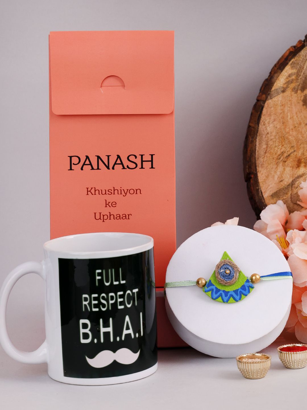

PANASH Set Of 2 B.H.A.I Rakhi With Printed Mugs And Roli Chawal, Gold