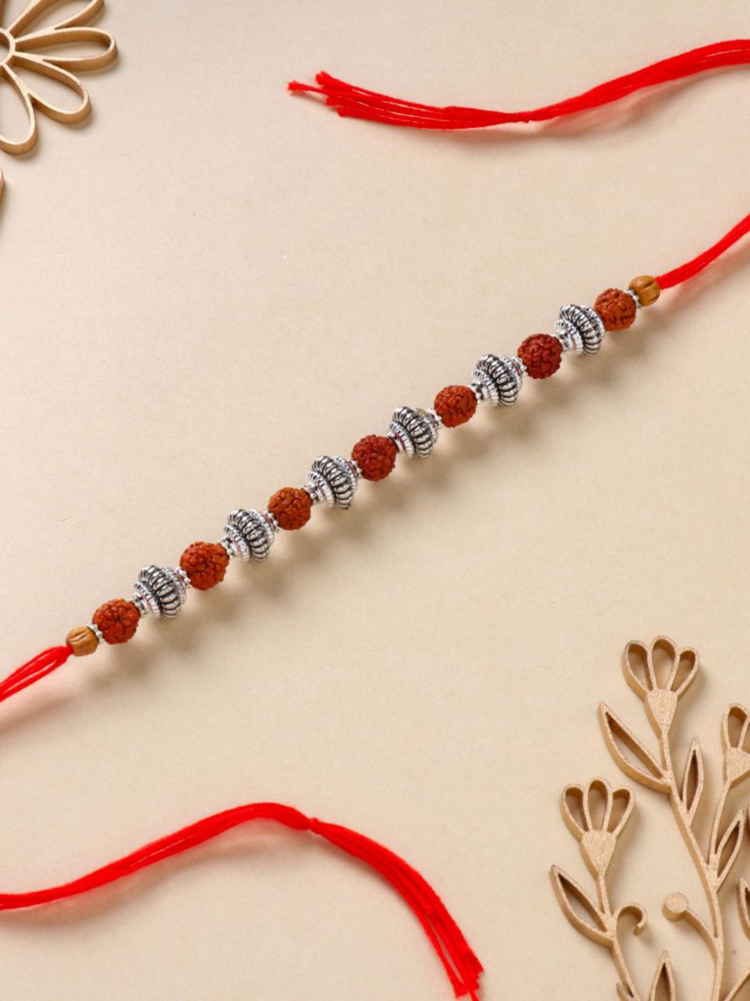 

Floweraura Designer Rudraksha Thread Rakhi with Roli Chawal, Silver