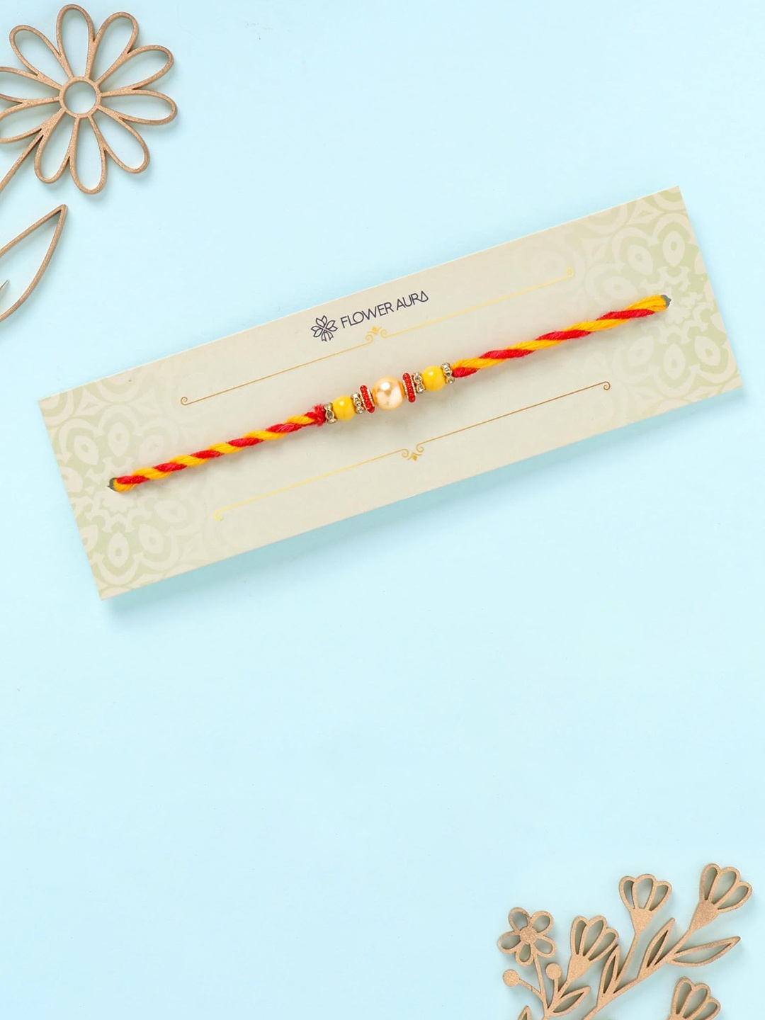 

Floweraura Stone Studded & Beaded Thread Rakhi With Roli Chawal, Red