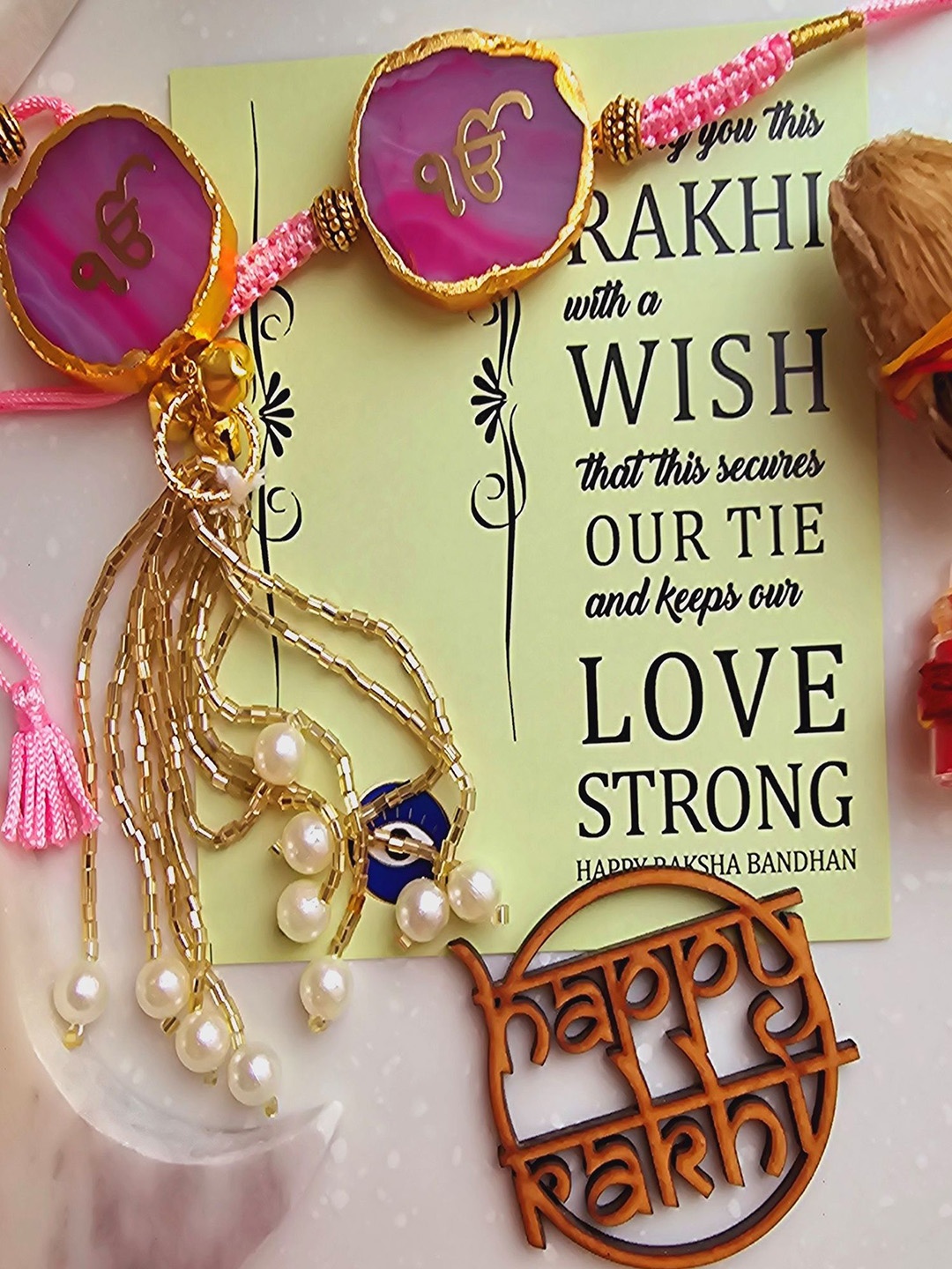 

HOMEARTE Agate Stone Bhaiya Bhabhi Thread Rakhi With Roli Chawal, Pink