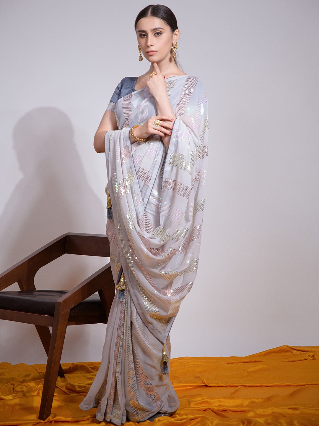 

QVAZOR Embellished Sequinned Pure Georgette Heavy Work Saree, Grey