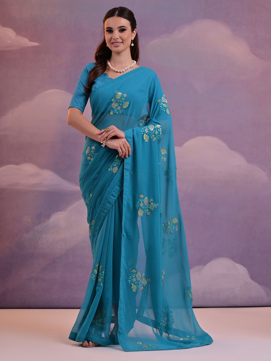 

QVAZOR Ethnic Motifs Sequinned Pure Georgette Saree, Blue