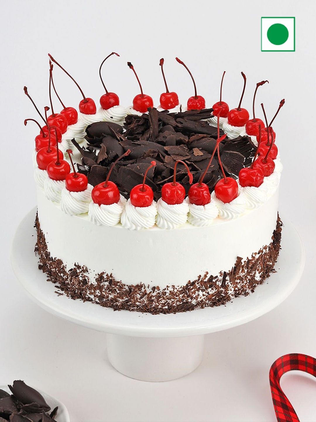 

IGP Black Forest Flavour Eggless Round Cake- 1Kg, White