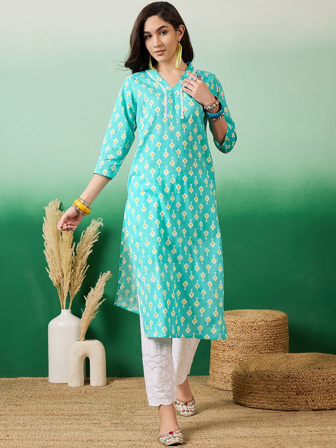 

Vastramyaa Geometric Printed V-Neck Pure Cotton Straight Kurta, Turquoise blue