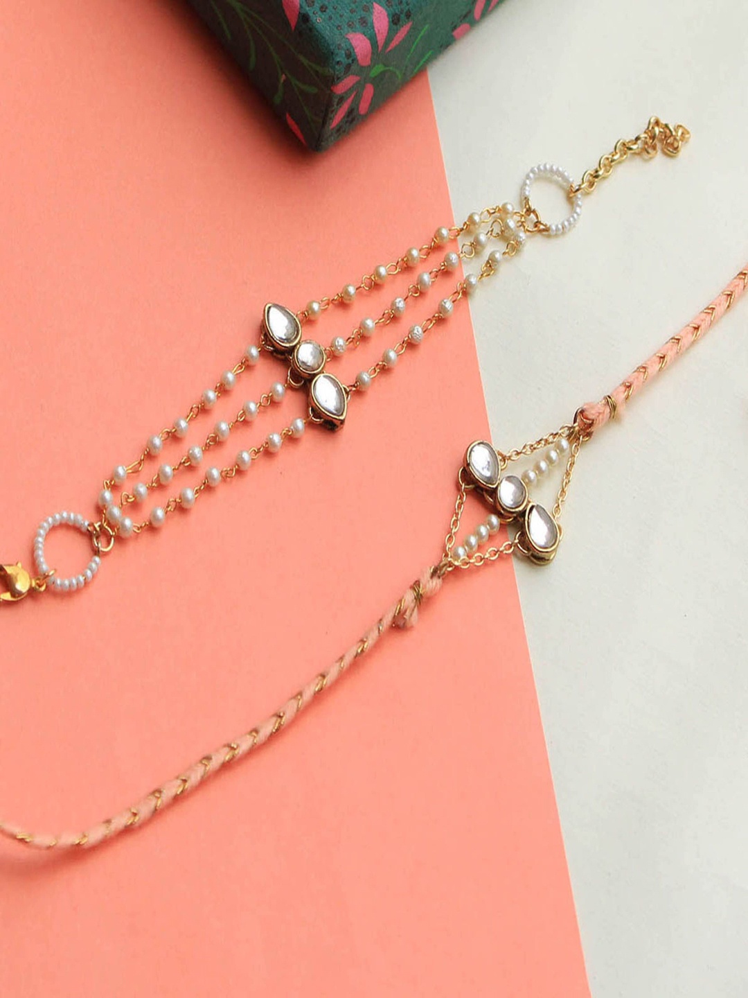 

BeAbhika Kundan Trio Bhaiya Bhabhi Lumba Rakhi With Roli Chawal Capsules, White