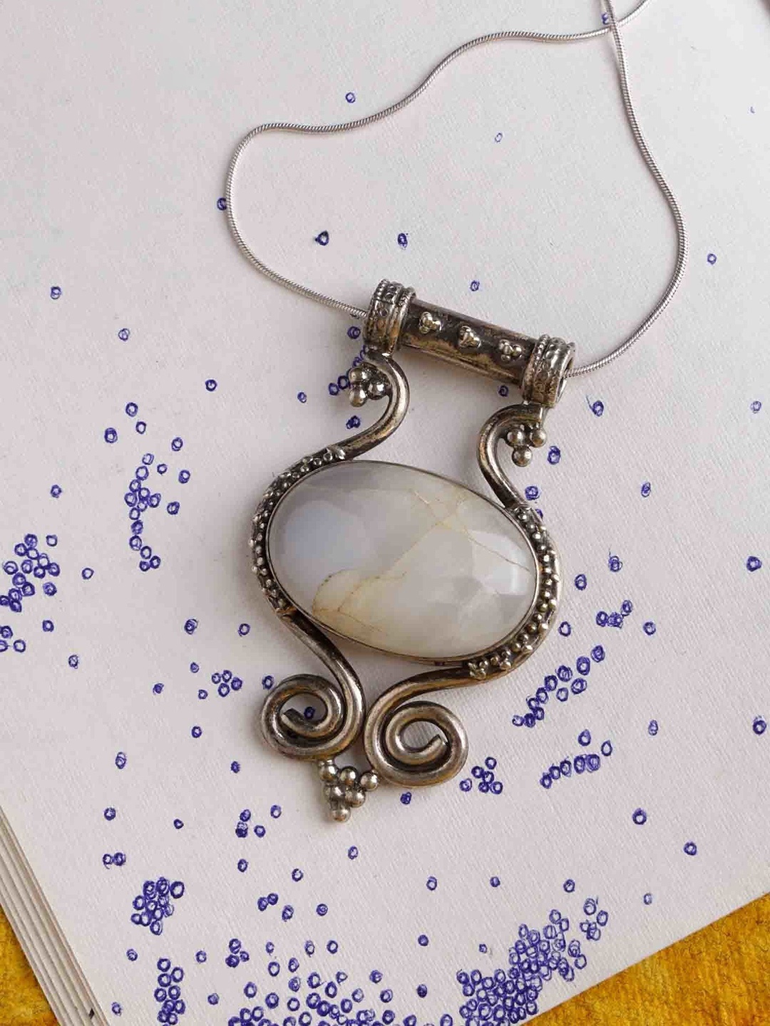 

Exotic India Rainbow Moonstone Sterling Silver Pendant