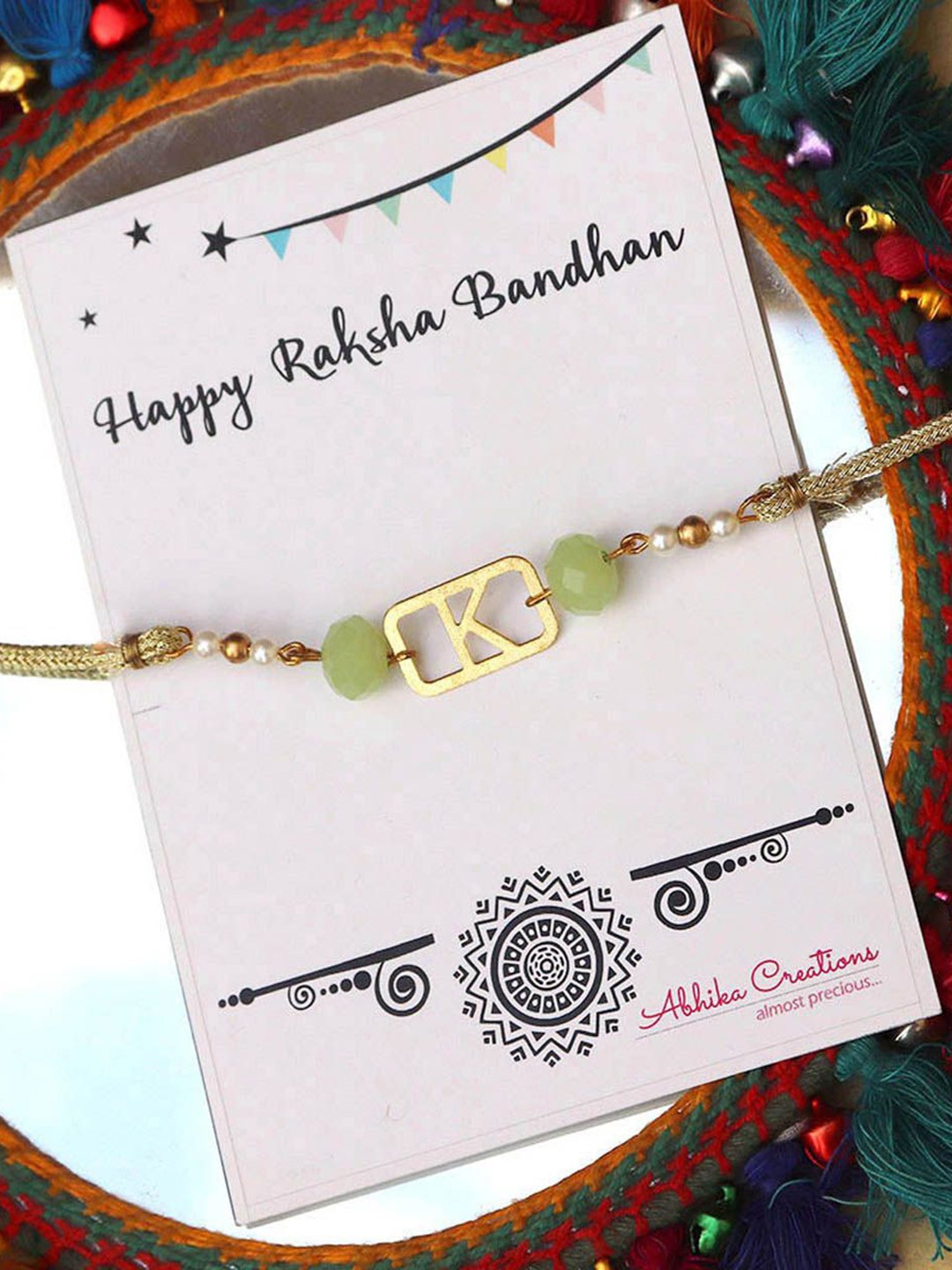 

BeAbhika "F" Initial Thread Rakhi WithRoli Chawal Capsules, Green