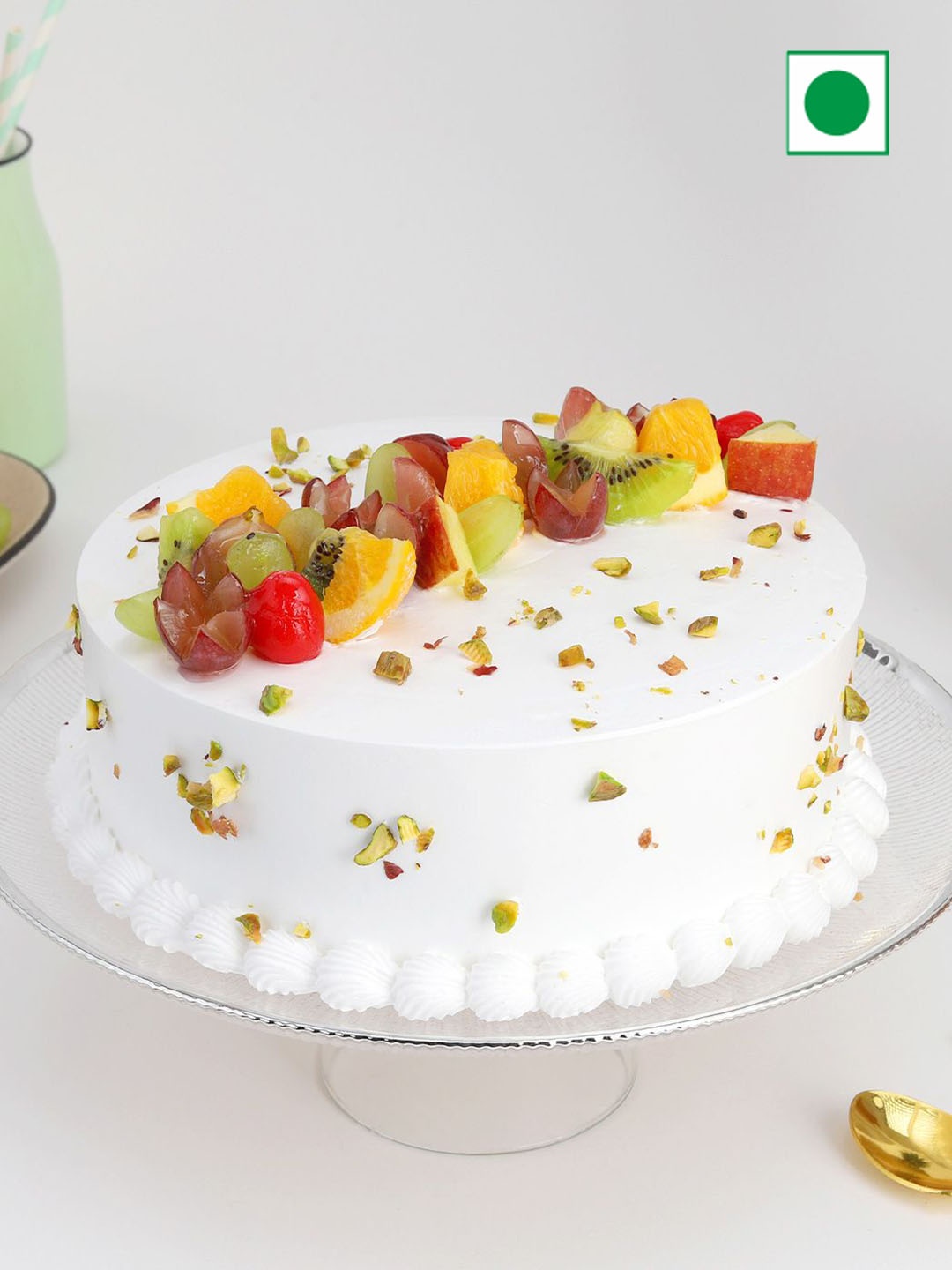 

IGP Mixed Fruit and Pineapple Flavor Eggless Round Cake- 1 Kg, White