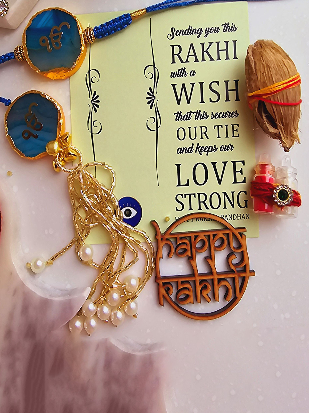 

HOMEARTE Agate Stone Bhaiya Bhabhi Thread Rakhi With Roli Chawal, Turquoise blue