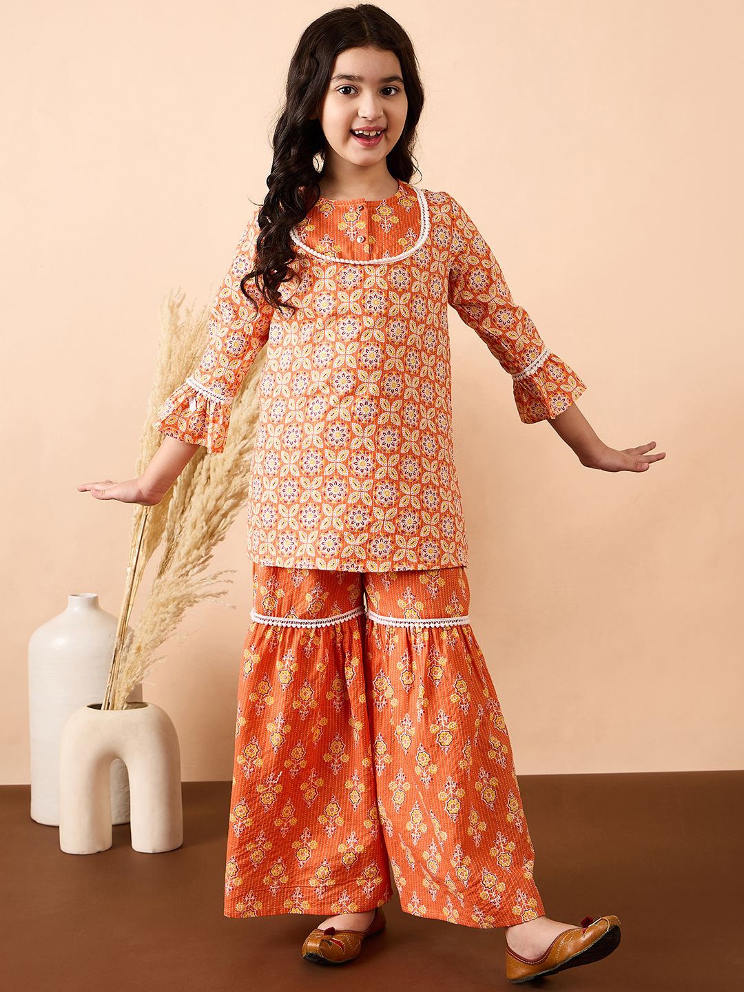 

Stylo Bug Girls Ethnic Motifs Printed Thread Work Regular Pure Cotton Kurta with Sharara, Orange