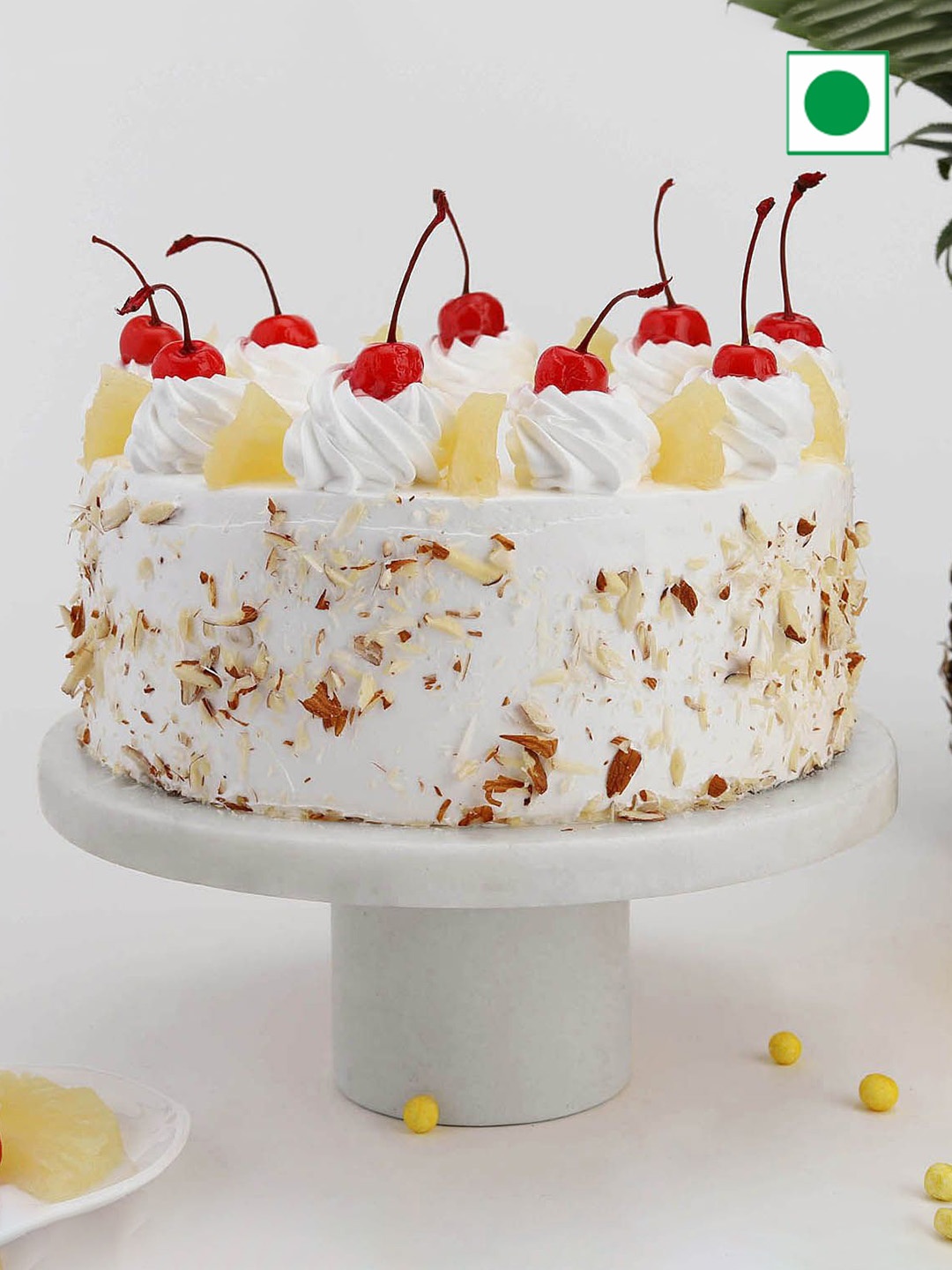 

IGP Pineapple Flavour Eggless Round Cake - 1kg, White