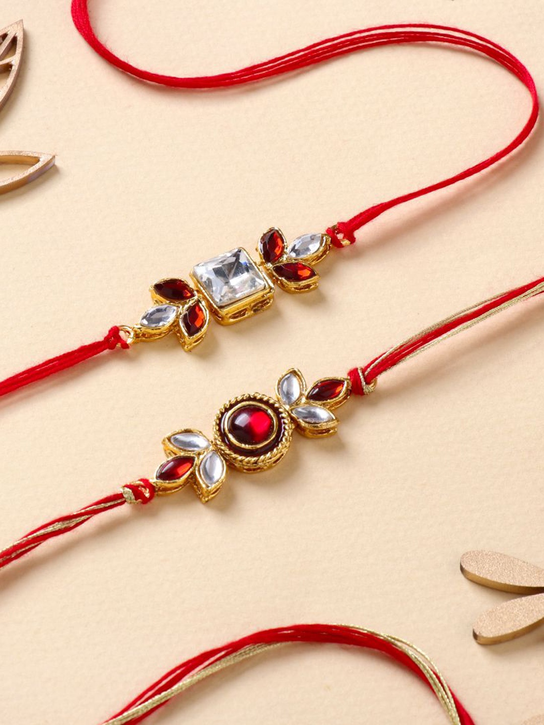 

Floweraura Set Of 2 Kundan Studded Thread Rakhis With Roli Chawal, Gold