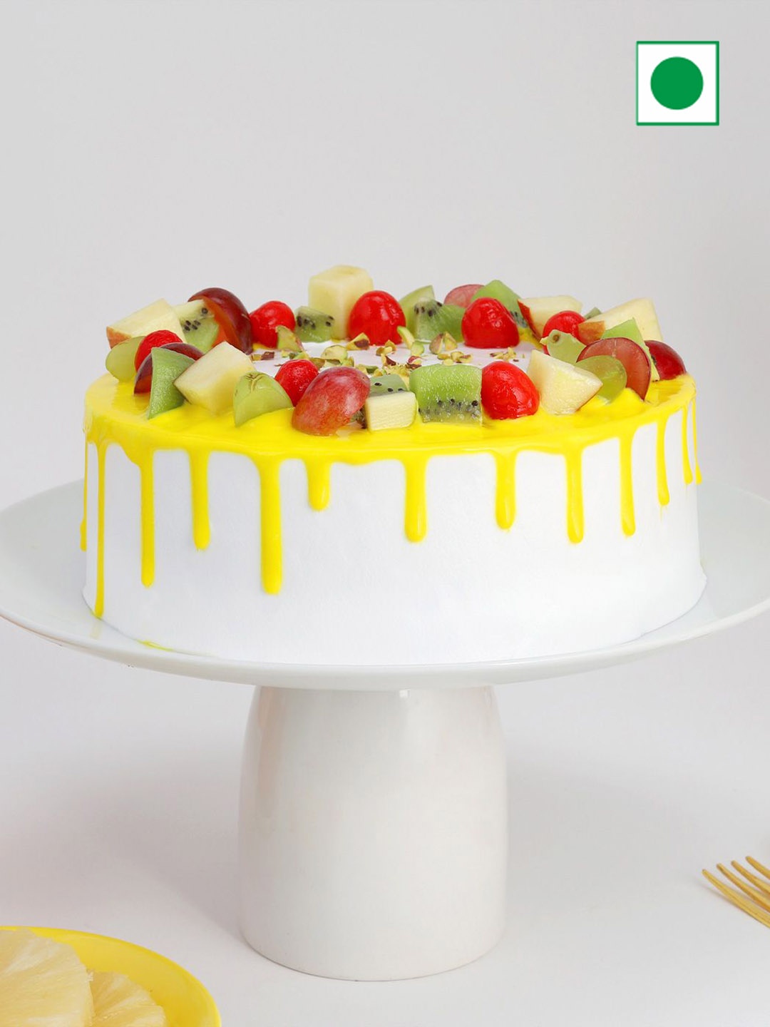 

IGP Fruit Flavour Eggless Round Cake - 1 kg, White