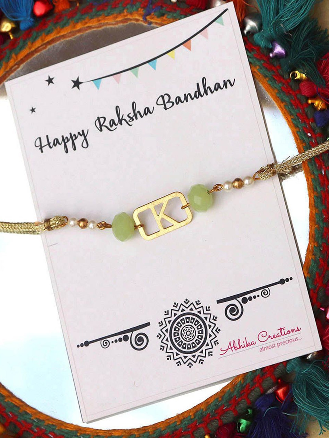 

BeAbhika Beaded K Initial Thread Rakhi With Roli Chawal, Gold