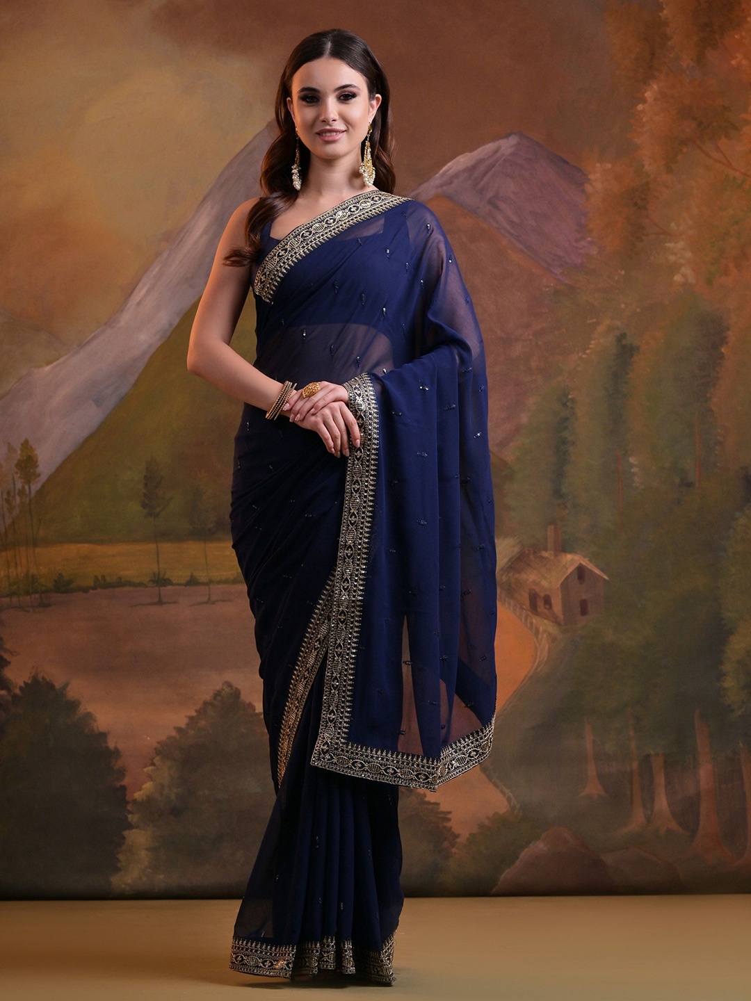 

QVAZOR Ethnic Motifs Sequinned Embroiderd Pure Georgette Saree, Blue