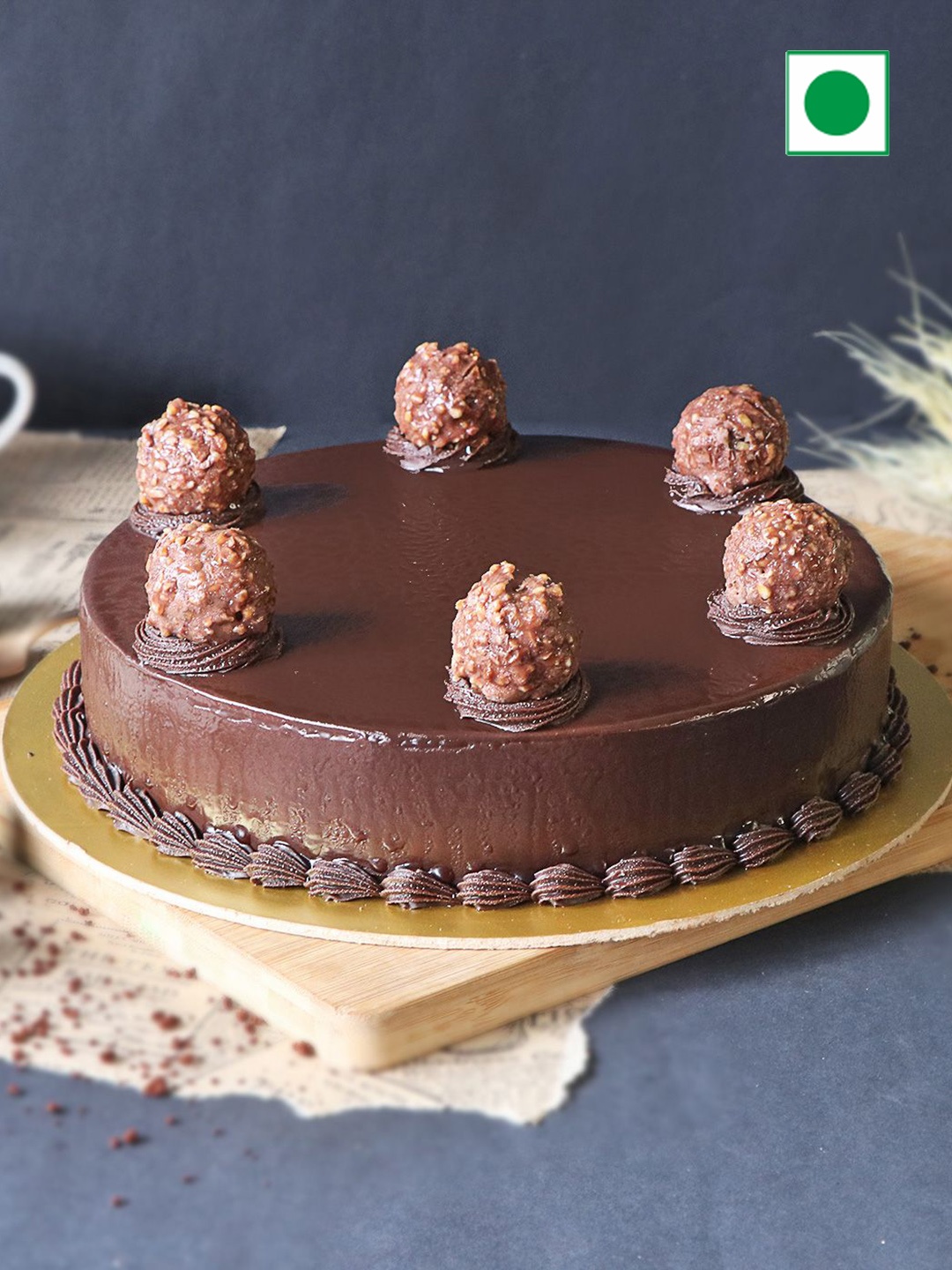 

IGP Choco-licious Truffle Flavour Eggless Round Cake- 1Kg, Black