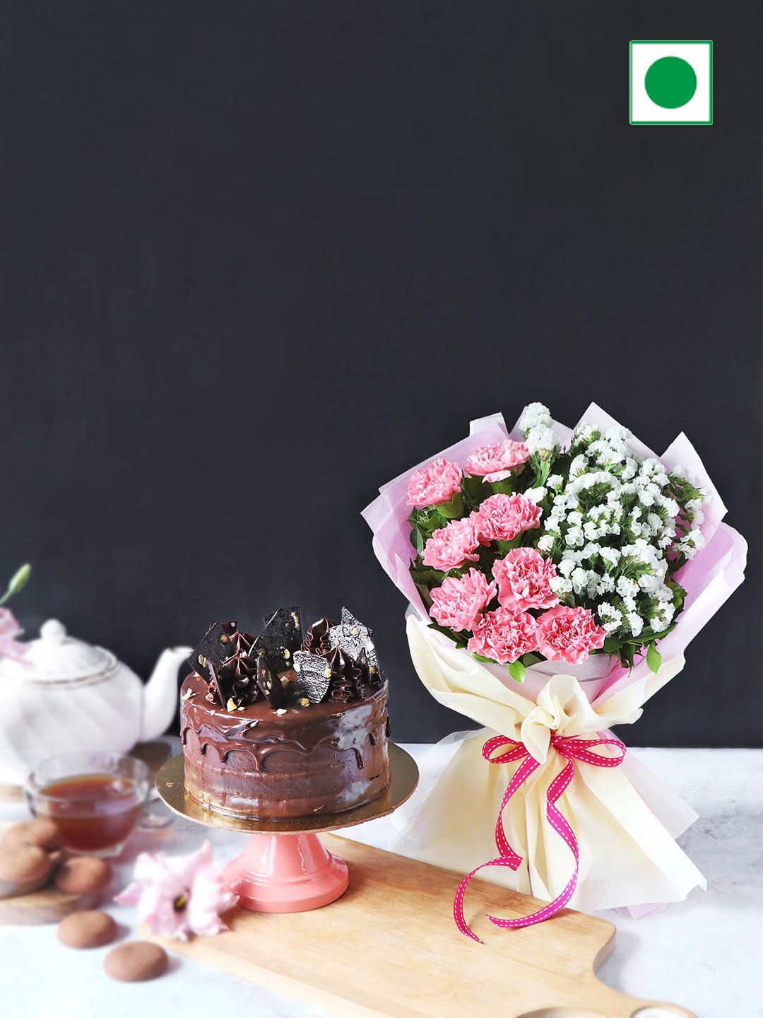 

IGP Fresh Flowers With Chocolate Flavor Eggless Round Cake- 450g, Black