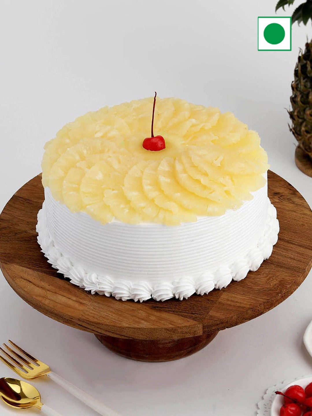 

IGP Pineapple Flavour Eggless Round Cake - 600 gm, White