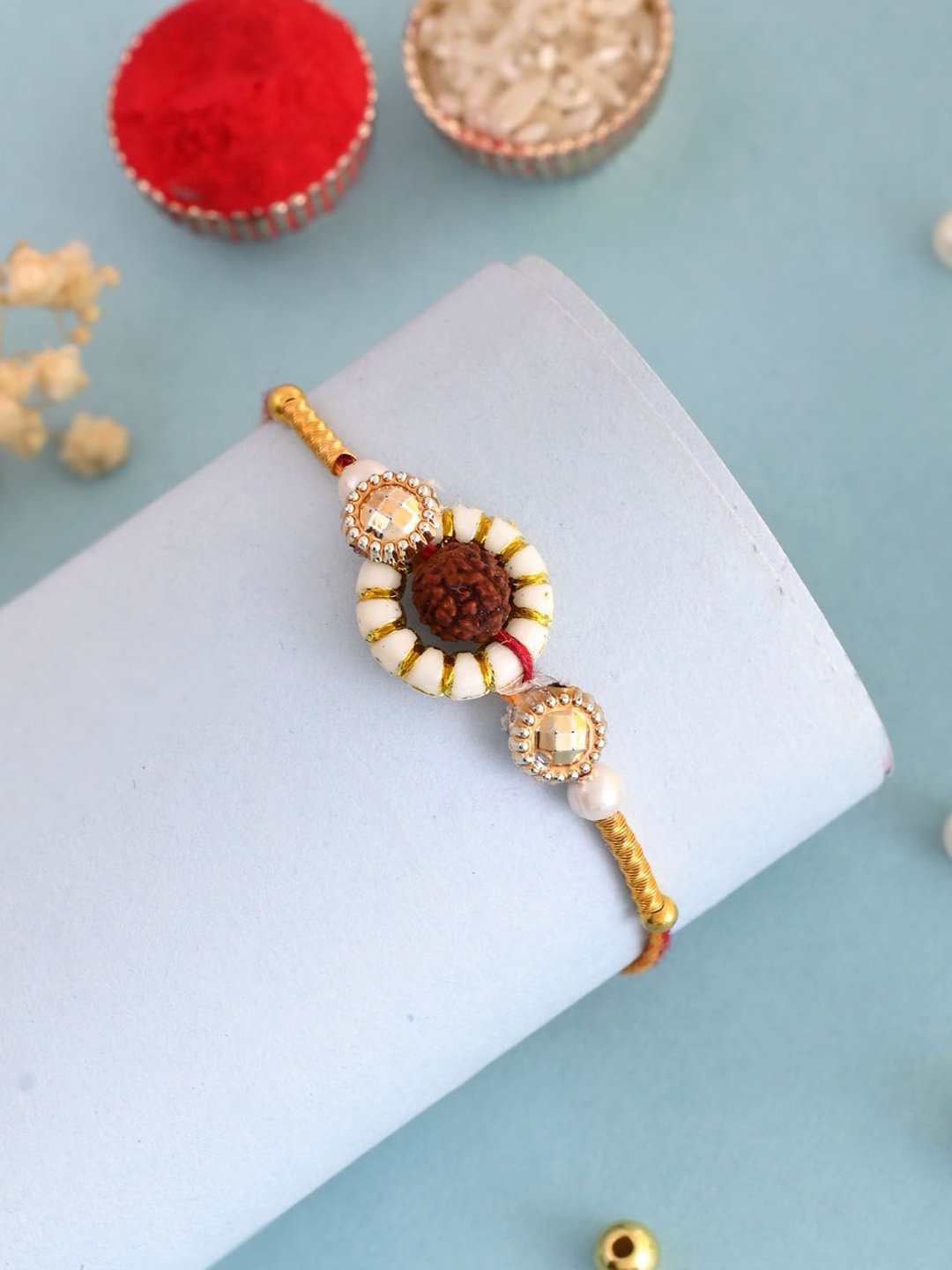 

Anouk Rudraksh Amidst Thread Rakhi With Roli Chawal & Greetings Card, Brown