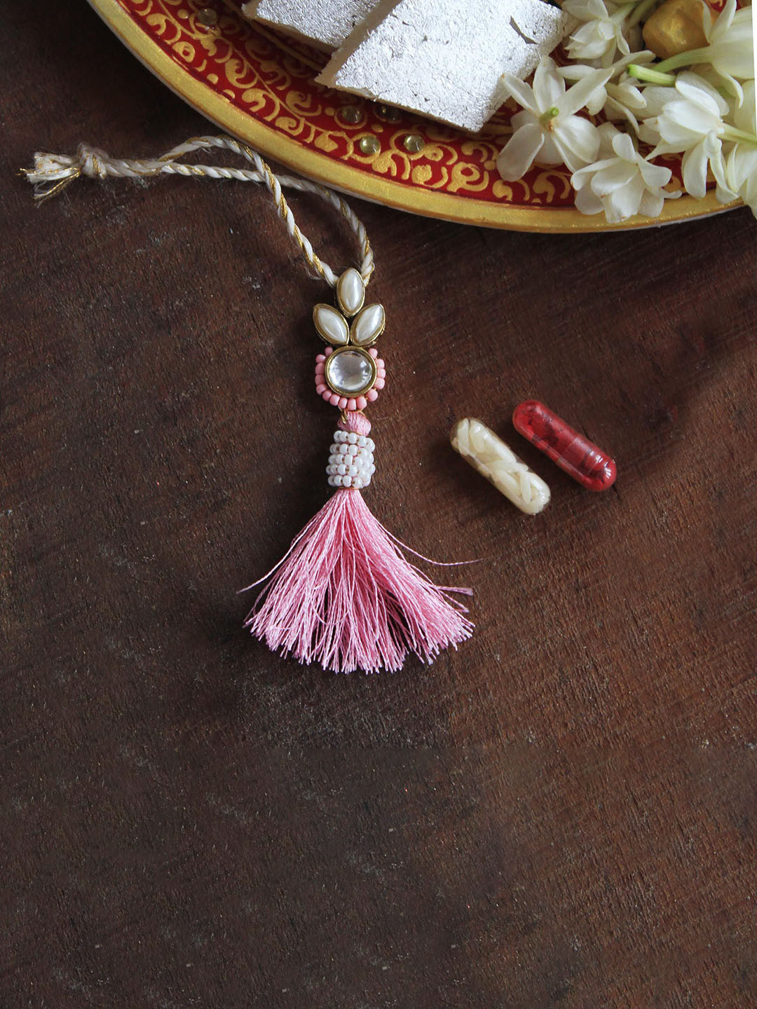 

BeAbhika Beaded Lumba Thread Rakhi With Roli Chawal, Pink