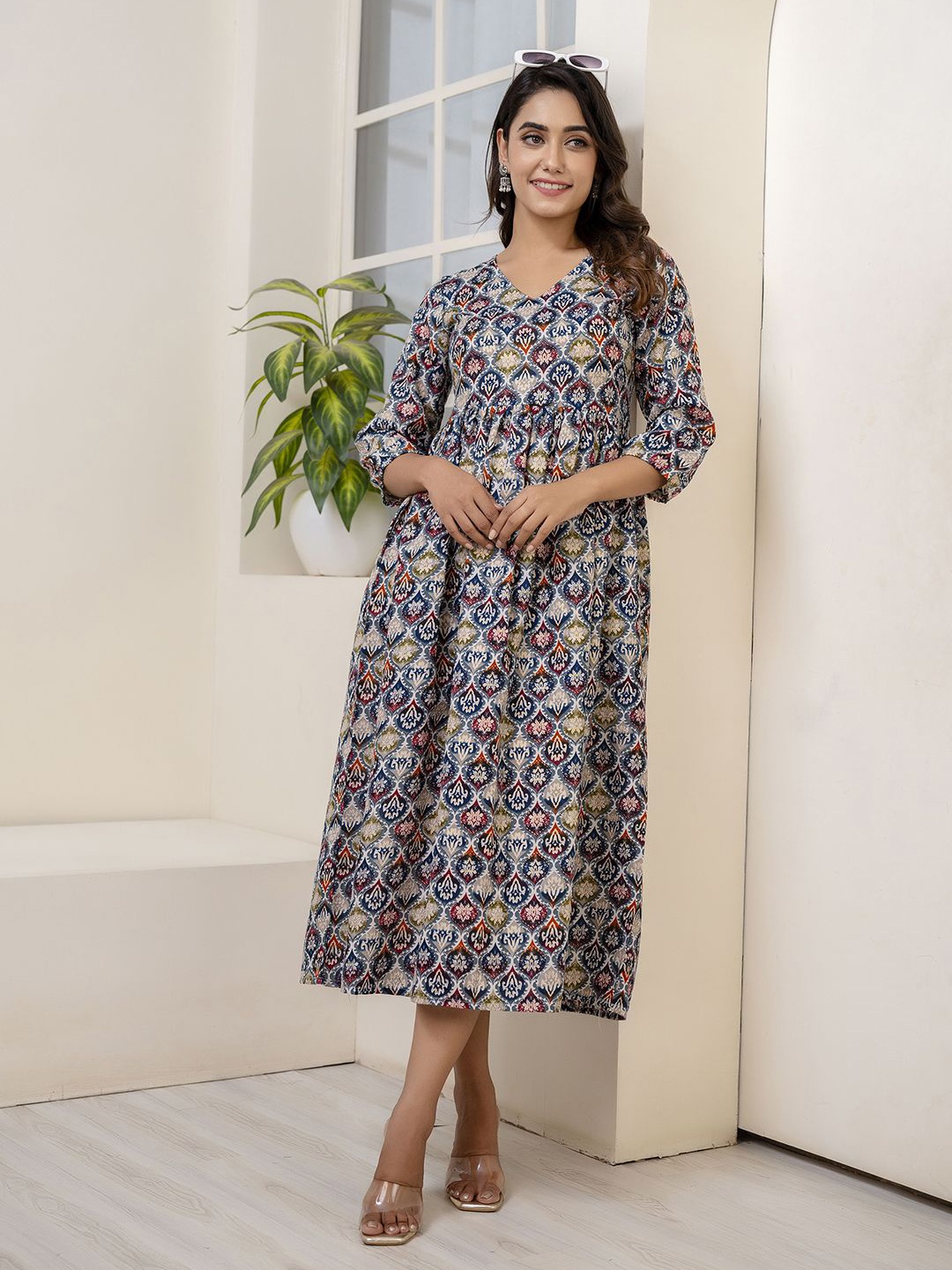 

Nayo Ethnic Motifs Printed A-Line Midi Ethnic Dress, Blue