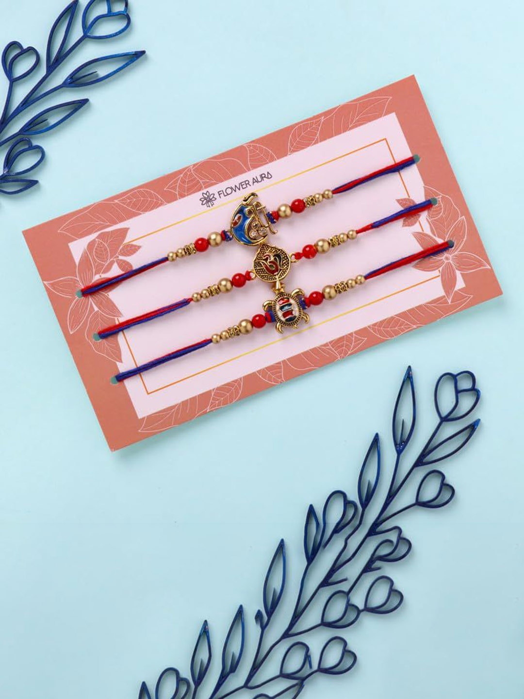 

Floweraura Set Of 3 Stone Studded & Beaded Thread Rakhi With Roli Chawal, Red