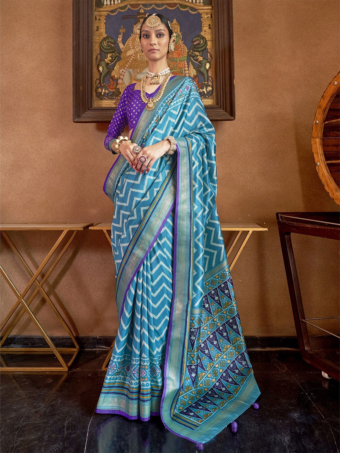 

elora Chevron Zari Woven Patola Saree, Turquoise blue