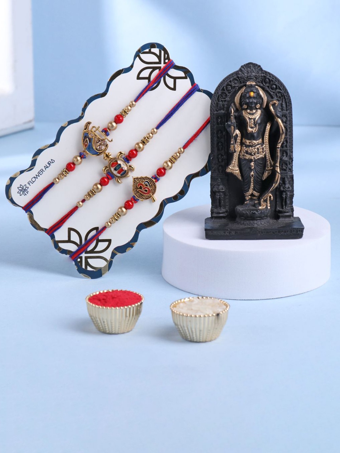 

Floweraura Set Of 4 Rakhi With Lord Shri Ram Lala Ji Idol Showpiece Gift Set, Gold