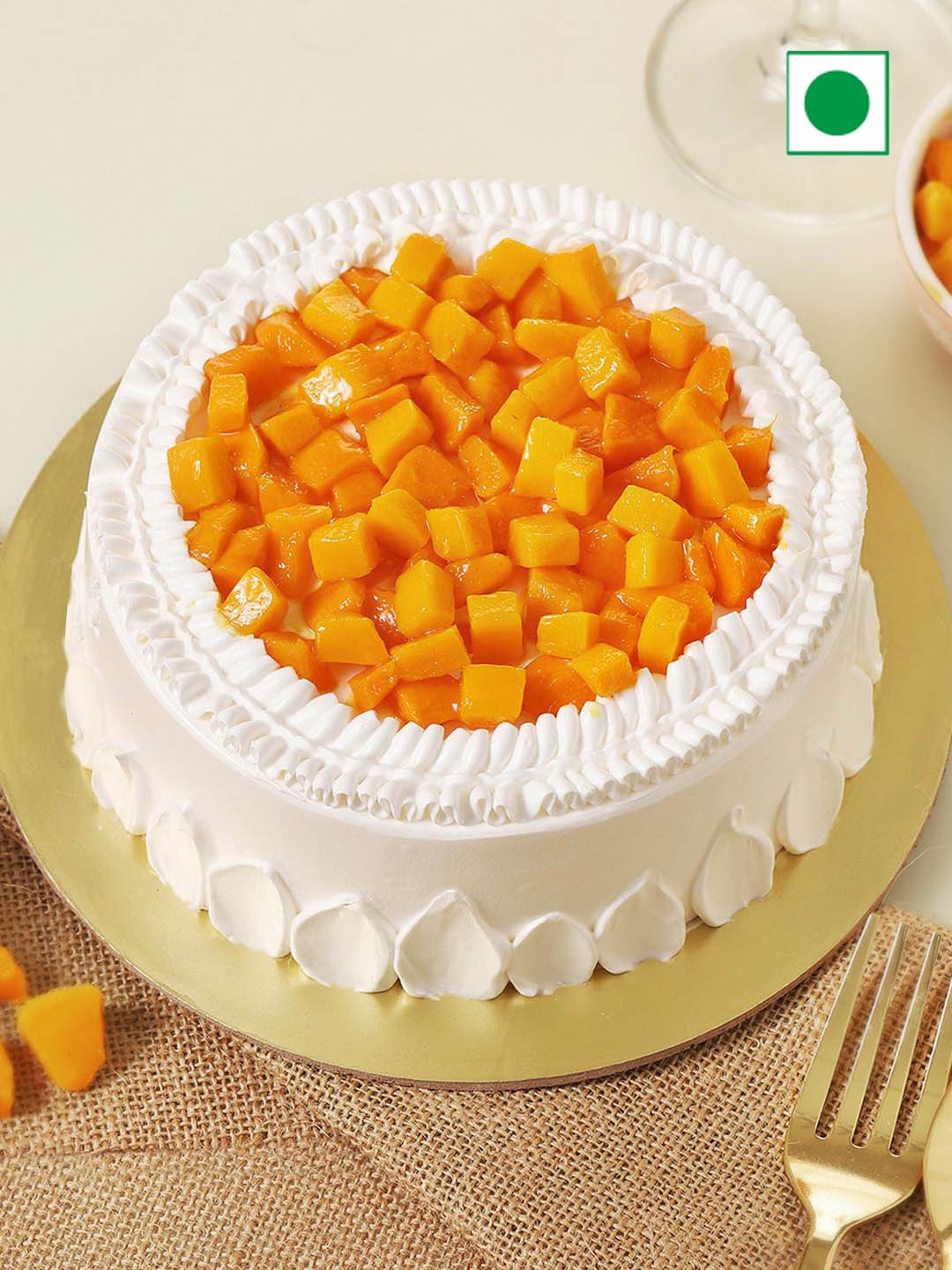 

IGP Mango Flavour Eggless Round Cake- 1Kg, White