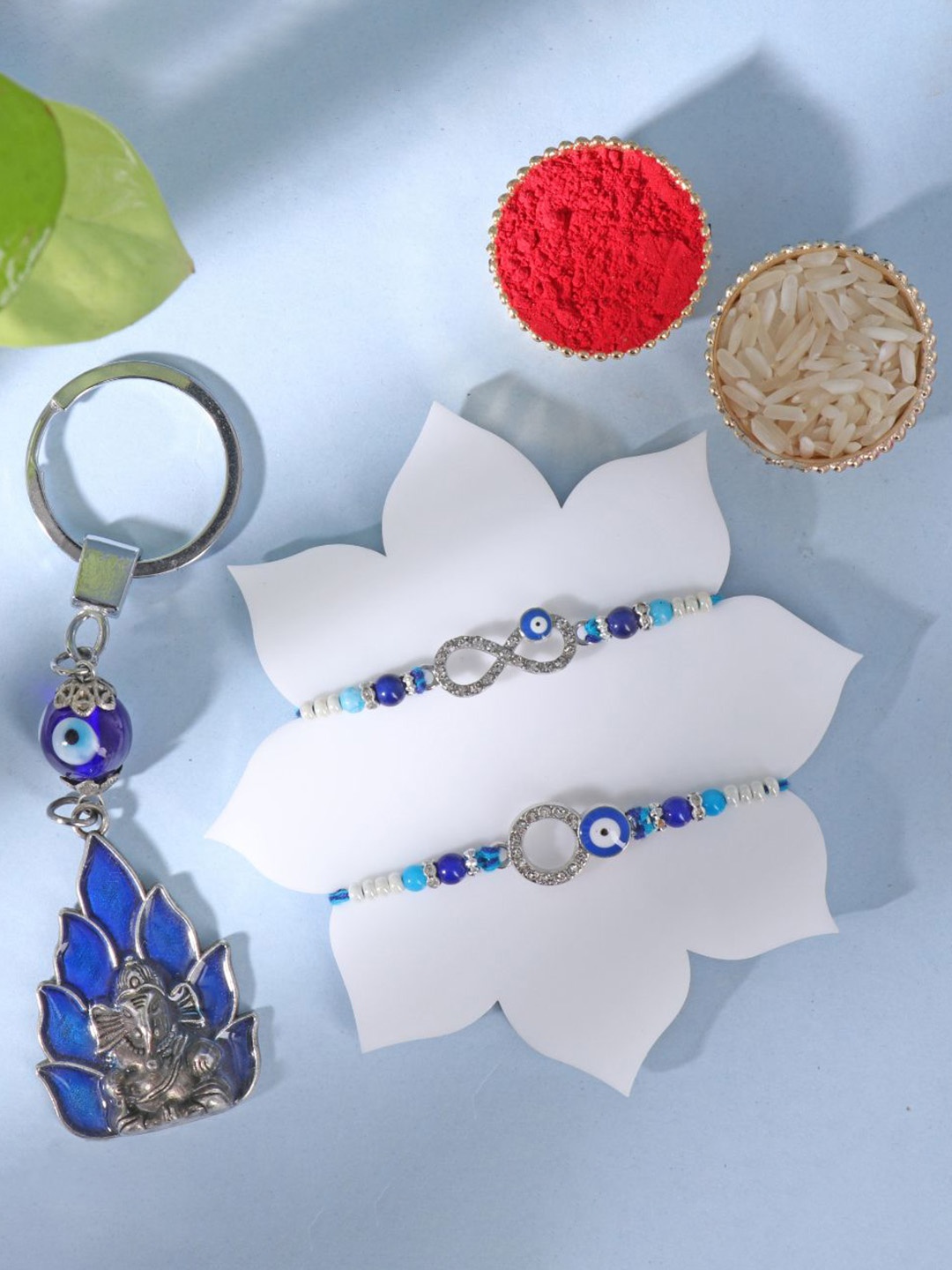 

Floweraura Set of 3 Beaded Rakhis With Key Chain & Roli Chawal, Blue
