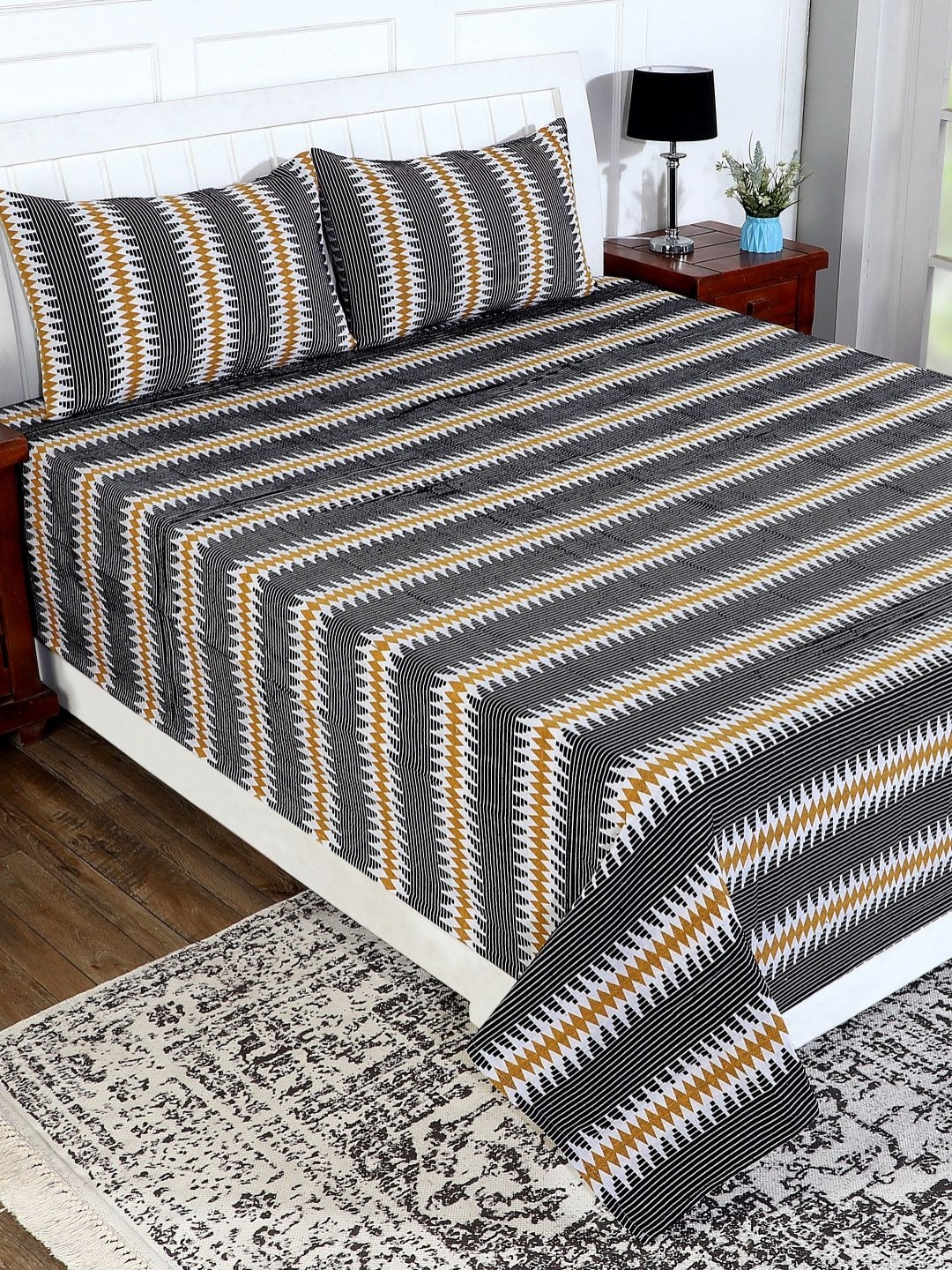 

Soumya Black & White Geometric Printed Cotton 1 Bed Cover 2 Pillow, Yellow