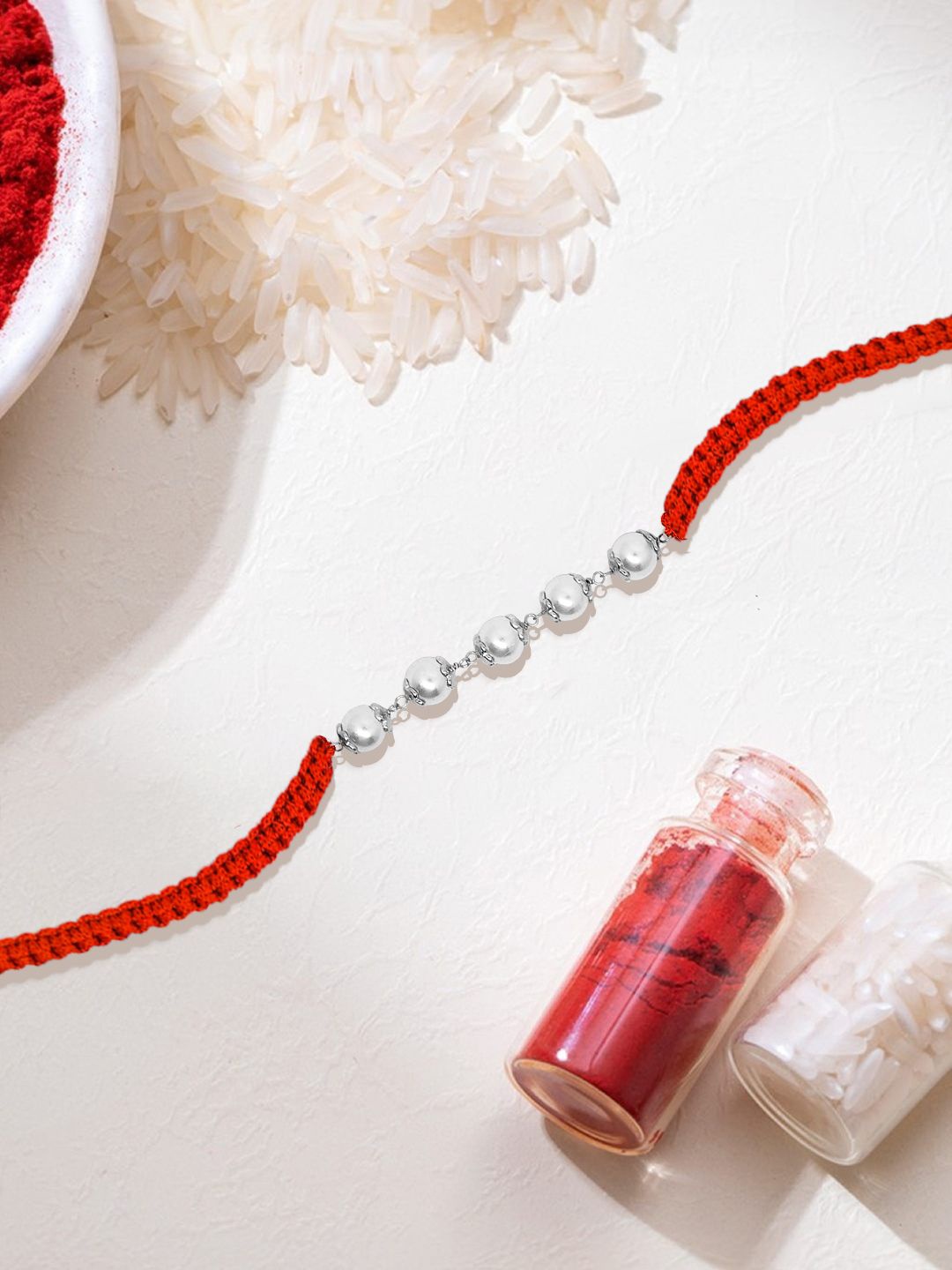 

Zavya 925 Sterling Silver Pearl Beaded Rakhi With Roli Chawal